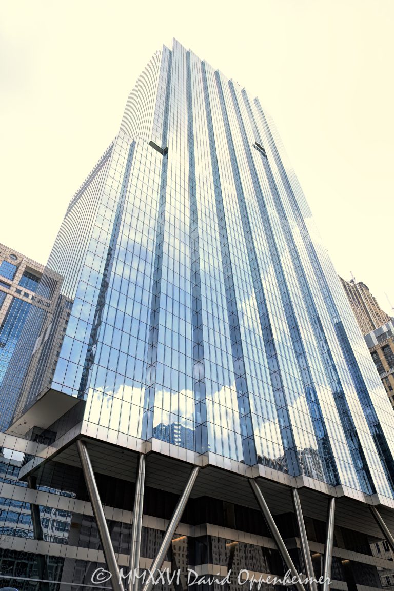 Bank of America Tower at 110 North Wacker Drive in downtown Chicago, Illinois, located along the Chicago River in the Loop business district. Contemporary Class A office skyscraper architecture designed by Goettsch Partners featuring reflective glass facade design, expansive riverwalk integration, and prominent riverfront positioning within the Chicago skyline. - © 2026 David Oppenheimer - Performance Impressions photography archives https://performanceimpressions.com 110 North Wacker, 110 North Wacker Drive, 110 N Wacker, Wacker Drive, Bank of America Tower, Bank of America Building, Bank of America Chicago, Goettsch Partners, Chicago, Chicago Illinois, Illinois, Downtown Chicago, Chicago Loop, Chicago River, architecture, Chicago architecture, architectural photography, urban architecture, modern architecture, contemporary architecture, skyscraper, high-rise, office tower, building, tower, office building, commercial building, corporate tower, commercial real estate, corporate real estate, real estate, business district, financial district, commercial architecture, corporate architecture, downtown, urban, riverfront architecture, riverfront tower, riverfront building, glass tower, glass building, glass facade, curtain wall, facade, reflections, river reflections, iconic building, landmark, American architecture, Illinois architecture, travel, tourism, metropolitan, exterior, daylight, waterfront, financial center, business center, Class A office building, office headquarters, Chicago skyscraper, Chicago office tower, glass skyscraper, reflective glass, riverwalk, Chicago riverwalk, modern skyscraper, contemporary skyscraper, downtown office tower, corporate headquarters, commercial tower, business architecture, Loop district, office architecture, urban development, financial district Chicago, licensing, image licensing, commercial imagery, photography licensing, art, print, fine art, commercial photography, David Oppenheimer, vertical, United States, 1-15156784411