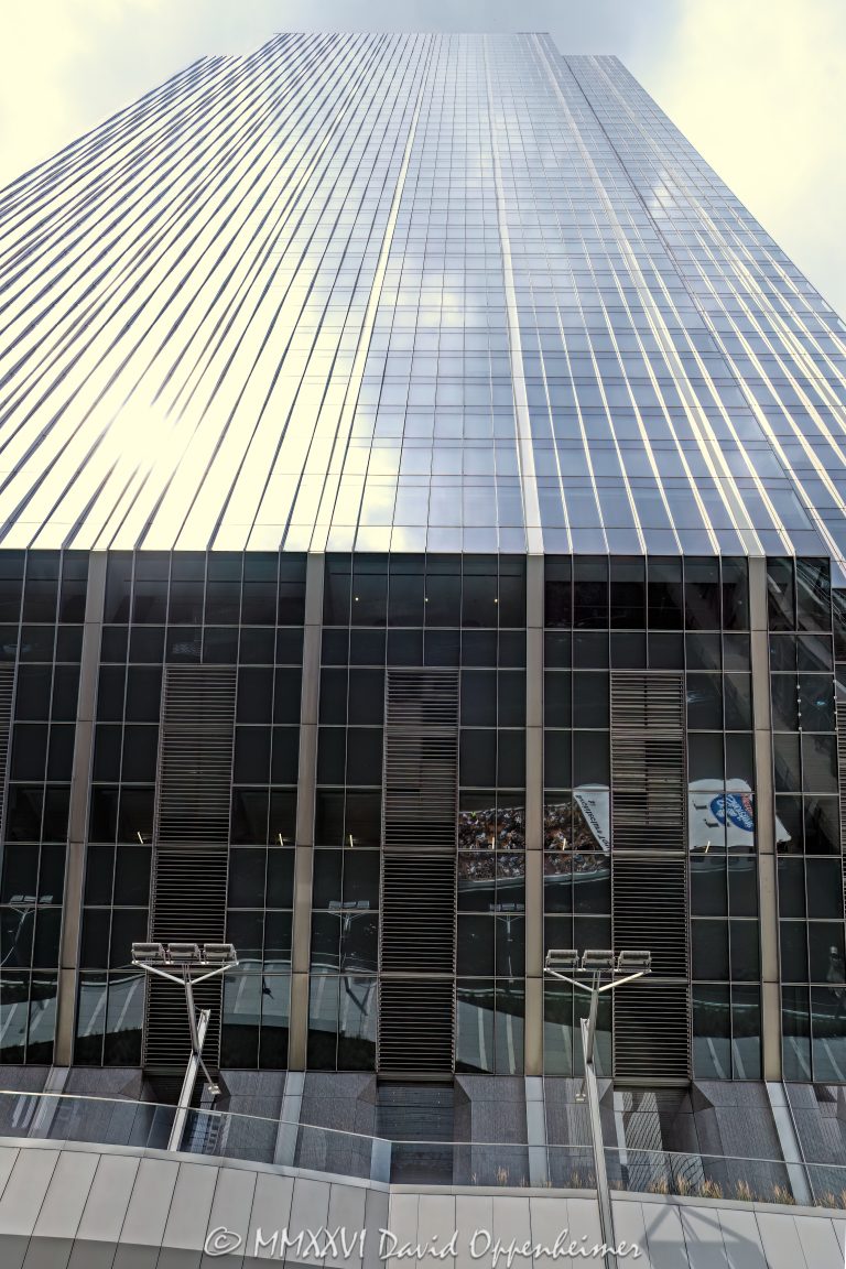 150 North Riverside Plaza office tower in downtown Chicago, Illinois, located along the Chicago River in the Loop business district. Contemporary commercial skyscraper architecture designed by Goettsch Partners featuring a distinctive cantilevered structural design, tapered base, reflective glass facade, and prominent riverfront positioning within Chicago’s financial district. The Class A office tower was engineered by Magnusson Klemencic Associates and developed above active rail lines serving Chicago Union Station. - © 2026 David Oppenheimer - Performance Impressions photography archives https://performanceimpressions.com 150 North Riverside, 150 North Riverside Plaza, 150 N Riverside, North Riverside Plaza, Riverside Plaza, Chicago, Chicago Illinois, Illinois, United States, Downtown Chicago, Chicago Loop, Chicago River, Chicago riverfront, architecture, Chicago architecture, architectural photography, urban architecture, modern architecture, contemporary architecture, skyscraper, high-rise, office tower, building, tower, office building, commercial building, corporate tower, commercial real estate, corporate real estate, real estate, business district, financial district, commercial architecture, corporate architecture, downtown, urban, riverfront architecture, riverfront tower, riverfront building, glass tower, glass building, glass facade, reflective glass, curtain wall, facade, reflections, river reflections, cantilever, cantilevered skyscraper, cantilevered design, tapered base, structural engineering, slender tower, iconic building, landmark, American architecture, Illinois architecture, exterior, daylight, waterfront, financial center, business center, Class A office building, office headquarters, Chicago skyscraper, Chicago office tower, glass skyscraper, riverwalk, Chicago riverwalk, modern skyscraper, contemporary skyscraper, downtown office tower, corporate headquarters, commercial tower, business architecture, Loop district, office architecture, urban development, financial district Chicago, Goettsch Partners, Magnusson Klemencic Associates, Clark Construction, Riverside Investment & Development, William Blair and Co, Hyatt Corporation, LEED Gold, WiredScore Platinum, 150 Media Stream, art, commercial art, tuning fork building, champagne flute building, commercial photography, fine art, image licensing, licensing, commercial imagery, vertical, David Oppenheimer, 1-15156784411