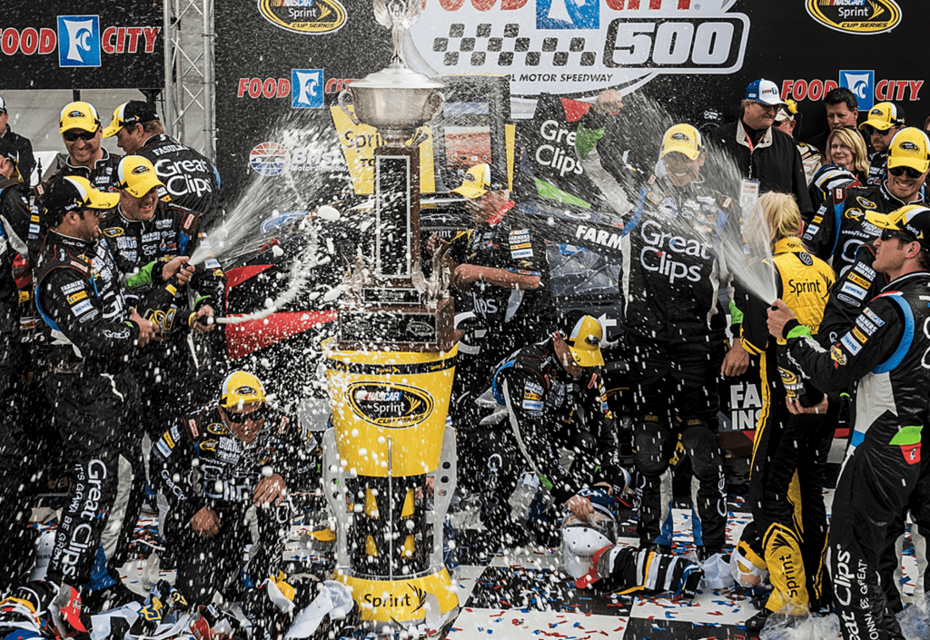 winning the trophy at nascar race