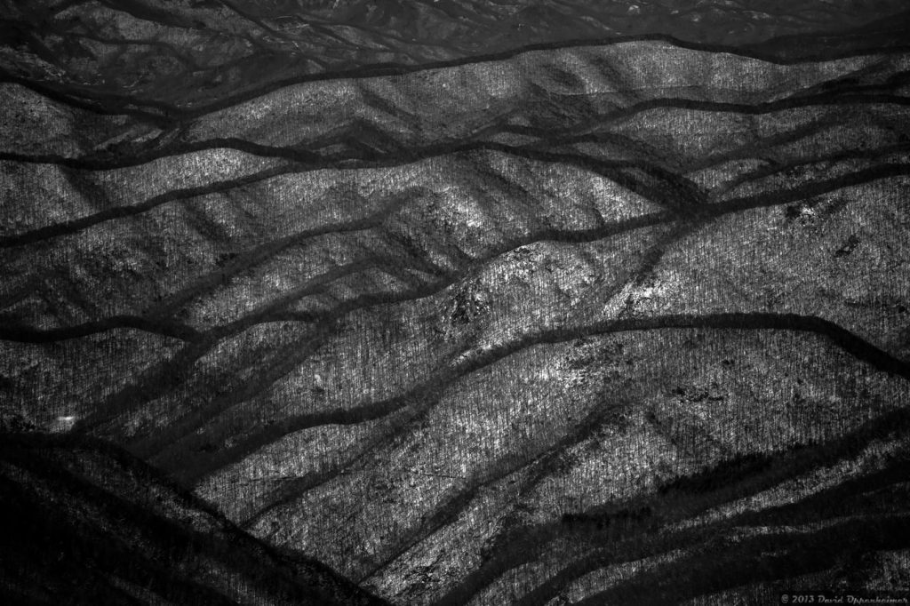 black and white photo of the blue ridge mountains covered in snow