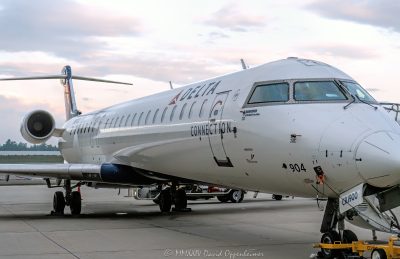 Bombardier CRJ900, Bombardier, CRJ900, Delta, Delta Air Lines, Delta Connection, commuter jet, commuter, airplane, plane, N904XJ, Asheville Regional Airport, AVL, KAVL, airport, Asheville Airport, Fletcher, aircraft, fly, flight, travel, air travel, Buncombe County, North Carolina, WNC, vacation, tourism, influx, visit, explore, regional jet, regional, sky, field, ready for takeoff, United States, horizontal, color, 1-13439195601,