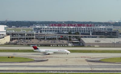 Delta Air Lines, Delta, Boeing 717, Boeing, N939AT, jet, taxiing, aircraft, airplane, plane, airport, Atlanta Airport, fly, fight, travel, air travel, airline, aviation, commercial jet, DAL, DAL stock, Hartsfield-Jackson Atlanta International Airport, Atlanta, ATL, KATL, BA, BA stock, runway, Georgia, aerial, aerial view, aerial photography, aerial photographer, David Oppenheimer, color, horizontal, United States, 1-13439195601,