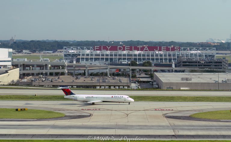 Delta Air Lines, Delta, Boeing 717, Boeing, N939AT, jet, taxiing, aircraft, airplane, plane, airport, Atlanta Airport, fly, fight, travel, air travel, airline, aviation, commercial jet, DAL, DAL stock, Hartsfield-Jackson Atlanta International Airport, Atlanta, ATL, KATL, BA, BA stock, runway, Georgia, aerial, aerial view, aerial photography, aerial photographer, David Oppenheimer, color, horizontal, United States, 1-13439195601,