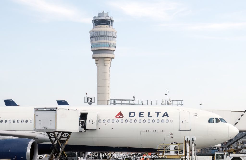 Air traffic control tower at Hartsfield-Jackson Atlanta International Airport in Atlanta, Georgia - © 2024 David Oppenheimer - Performance Impressions aviation photography archives - https://performanceimpressions.com air traffic control, ATC, ATC tower, control tower, tower, ATL, Delta, Delta Air Lines, DAL, plane, Hartsfield-Jackson Atlanta International Airport, Hartsfield-Jackson, KATL, airspace, aviation, aircraft, guidance, air traffic, transportation, airport, airport traffic, Atlanta Tower, radar, ground control, GMC, approach control, approach, terminal, route, control, collision avoidance, weather, runway, navigation, safety, airlines, Ramp 6, IFR, Atlanta, Georgia, tallest, tall, Clayton County, David Oppenheimer, color, horizontal, United States, 1-13726821381