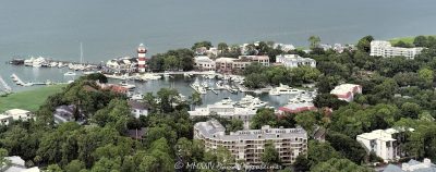 Harbour Town Lighthouse at 149 Lighthouse Road on Hilton Head Island, South Carolina, aerial view © 2024 David Oppenheimer - Performance Impressions aerial photography archives - https://performanceimpressions.com Harbour Town Lighthouse, Harbour Town Lighthouse aerial, lighthouse, Harbour Town, Liberty Oak, Liberty Oak park, park, marina, lighthouse, museum, history, Harbour Town aerial, Harbour Town aerial view, Harbour Town Marina, Harbour Town Marina aerial, Pirates of Hilton Head, Harbour Town Pier, pier, Harbour Town Yacht Basin, 149 Lighthouse Road, Haig Point Water Taxi, docks, water taxi, memorial park, coast, Harbour Town Yacht Club, harbor, yachts, boats, yacht club, Schooner Court Villas, Caravel Court Villas, Ketch Court Villas, Clipper Court Villas, Marriott's Harbour Club, Marriott's Heritage Club, vacation club, Harbour Town Golf Links, golf, golf course, Vagabond Cruise, sightseeing, shopping, retail, Sea Pines Resort, sea pines, resort, Harbour Town Golf Links, golf, golf course, vacation, Hilton Head, Hilton Head Island, Town of Hilton Head, 29928, South Carolina, Lowcountry, Hilton head island real estate, Hilton Head real estate, real estate, aerial photographer, aerial photography, aerial view, aerial, building, architecture, David Oppenheimer, David Gordon Oppenheimer, United States, color, horizontal, 1-13726821381,