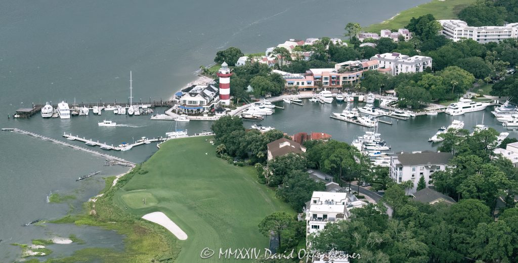 Harbour Town Lighthouse at 149 Lighthouse Road on Hilton Head Island, South Carolina, aerial view © 2024 David Oppenheimer - Performance Impressions aerial photography archives - https://performanceimpressions.com Harbour Town Lighthouse, Harbour Town Lighthouse aerial, lighthouse, Harbour Town, Liberty Oak, Liberty Oak park, park, marina, Harbour Town Marina, Harbour Town Marina aerial, lighthouse, museum, history, Harbour Town aerial, Harbour Town aerial view, Pirates of Hilton Head, Harbour Town Pier, pier, Harbour Town Yacht Basin, 149 Lighthouse Road, Haig Point Water Taxi, docks, water taxi, memorial park, coast, Harbour Town Yacht Club, harbor, yachts, boats, yacht club, Marriott's Harbour Club, Schooner Court Villas, Marriott, Harbour Club, Harbour Town Golf Links, golf, golf course, Vagabond Cruise, sightseeing, shopping, retail, Sea Pines Resort, sea pines, resort, Harbour Town Golf Links, golf, golf course, vacation, Hilton Head, Hilton Head Island, Town of Hilton Head, 29928, South Carolina, Lowcountry, Hilton head island real estate, Hilton Head real estate, real estate, aerial photographer, aerial photography, aerial view, aerial, building, architecture, David Oppenheimer, David Gordon Oppenheimer, United States, color, horizontal, 1-13726821381,