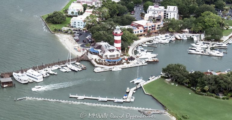 Harbour Town Lighthouse at 149 Lighthouse Road on Hilton Head Island, South Carolina, aerial view © 2024 David Oppenheimer - Performance Impressions aerial photography archives - https://performanceimpressions.com Harbour Town Lighthouse, Harbour Town Lighthouse aerial, lighthouse, Harbour Town, Liberty Oak, Liberty Oak park, park, marina, Harbour Town Marina, Harbour Town Marina aerial, lighthouse, museum, history, Harbour Town aerial, Harbour Town aerial view, Pirates of Hilton Head, Harbour Town Pier, pier, 149 Lighthouse Road, Haig Point Water Taxi, docks, water taxi, memorial park, coast, Harbour Town Yacht Basin, Harbour Town Yacht Club, harbor, yachts, boats, yacht club, Schooner Court Villas, Harbour Town Golf Links, golf, golf course, Vagabond Cruise, sightseeing, shopping, retail, Sea Pines Resort, sea pines, resort, Harbour Town Golf Links, golf, golf course, vacation, Hilton Head, Hilton Head Island, Town of Hilton Head, 29928, South Carolina, Lowcountry, Hilton head island real estate, Hilton Head real estate, real estate, aerial photographer, aerial photography, aerial view, aerial, building, architecture, David Oppenheimer, David Gordon Oppenheimer, United States, color, horizontal, 1-13726821381,