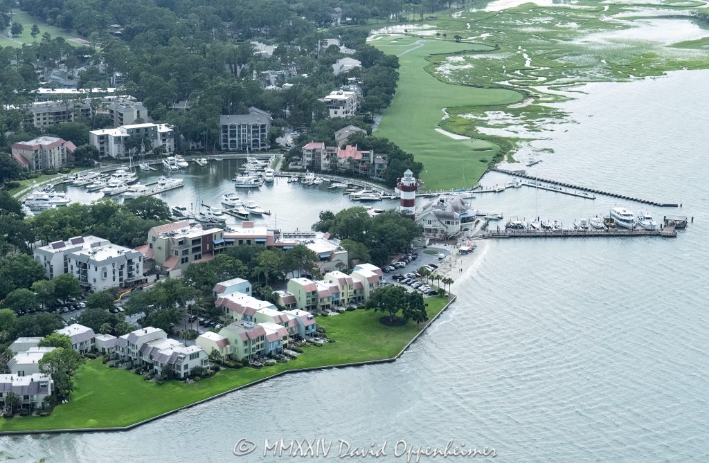 Harbour Town Lighthouse at 149 Lighthouse Road on Hilton Head Island, South Carolina, aerial view © 2024 David Oppenheimer - Performance Impressions aerial photography archives - https://performanceimpressions.com Harbour Town Lighthouse, Harbour Town Lighthouse aerial, lighthouse, Harbour Town, Liberty Oak, Liberty Oak park, park, marina, lighthouse, museum, history, Harbour Town aerial, Harbour Town aerial view, Harbour Town Yacht Basin, Pirates of Hilton Head, Harbour Town Pier, pier, 149 Lighthouse Road, Haig Point Water Taxi, docks, water taxi, memorial park, coast, Harbour Town Yacht Club, harbor, yachts, boats, yacht club, Schooner Court Villas, Caravel Court Villas, Ketch Court Villas, Clipper Court Villas, Marriott's Heritage Club, vacation club, Harbour Town Golf Links, golf, golf course, Vagabond Cruise, sightseeing, shopping, retail, Sea Pines Resort, sea pines, resort, Harbour Town Golf Links, golf, golf course, vacation, Hilton Head, Hilton Head Island, Town of Hilton Head, 29928, South Carolina, Lowcountry, Hilton head island real estate, Hilton Head real estate, real estate, aerial photographer, aerial photography, aerial view, aerial, building, architecture, David Oppenheimer, David Gordon Oppenheimer, United States, color, horizontal, 1-13726821381,