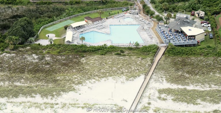 Hilton Head Island Beach & Tennis Resort Pool and Jamaica Joe’z Beach Bar at 40 Folly Field Road in Hilton Head, South Carolina, aerial view - © 2024 David Oppenheimer - Performance Impressions aerial photography archives - https://performanceimpressions.com Hilton Head Island Beach and Tennis Resort, 40 Folly Field Rd, beach, beachfront, beach access, tennis, tennis courts, Jamaica Joez, Jamaica Joez Beach Bar, restaurant, grill, pool, vacation, vacation rentals, resort, hotel, vacation, Hilton Head, Hilton Head Island, Town of Hilton Head, South Carolina, Lowcountry, Hilton head island real estate, Hilton Head real estate, real estate, Hilton Head aerial, aerial photographer, aerial photography, photography, aerial view, aerial, building, architecture, 29928, David Oppenheimer, David Gordon Oppenheimer, United States, color, horizontal, 1-13726821381,