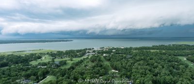 Arcus shelf cloud thunderstorm front squall line over Calibogue Sound by Hilton Head Island, South Carolina aerial view - © 2024 David Oppenheimer - Performance Impressions photography archives - https://performanceimpressions.com shelf cloud, clouds, cloud front, front, storm, wall, thunderstorm, storm front, squall line, arcus, arcus cloud, convection, weather, Hilton Head, Hilton Head Island, Hilton Head aerial, Hilton Head Island aerial, cumulonimbus, air, atmosphere, wind, downdraft, meteorology, Hilton Head storm, Hilton Head Island weather, Hilton Head weather, Hilton Head Island Storm, aviation, flying, turbulence, wind shear, offshore, safety, conditions, helicopter, flight, FAA, NCEP, pilots, FSS, METAR, SPECI, observation, visibility, ceiling, sky, operations, logistics, Calibogue Sound, Buck Island, Broad Creek, Comfort Creek, Lawton, Lawtown Creek, Shark Bank, Bull Island, Daufuskie Island, marsh, marshlands, Long Island, Calibogue Club, Sea Pines, Stoney Creek, Calibogue Club Villas, Sea Loft Villas, Sea Loft, Fairway Oaks Villas, Fairway Oaks, Plantation Club, Plantation Club Villas, Sea Pines Resort, beach, beach access, coast, South Carolina coast, coastal, shoreline, shore, shoreline aerial, waterfront, dunes, sand, beachfront, sand dunes, vacation, vacation homes, beach houses, houses, beach homes, summer, summer homes, residences, properties, Atlantic Ocean, Hilton Head, Hilton Head Island, Town of Hilton Head, South Carolina, coastline, coastline aerial, luxury, Lowcountry, Hilton head island real estate, Hilton Head real estate, real estate, Hilton Head aerial, Harbour Town Lighthouse, Harbour Town, aerial photographer, aerial photography, photography, aerial view, aerial, 29928, David Oppenheimer, David Gordon Oppenheimer, United States, color, horizontal, 1-13726821381,