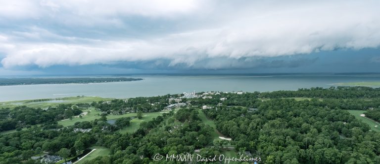 Arcus shelf cloud thunderstorm front squall line over Calibogue Sound by Hilton Head Island, South Carolina aerial view - © 2024 David Oppenheimer - Performance Impressions photography archives - https://performanceimpressions.com shelf cloud, clouds, cloud front, front, storm, wall, thunderstorm, storm front, squall line, arcus, arcus cloud, convection, weather, Hilton Head, Hilton Head Island, Hilton Head aerial, Hilton Head Island aerial, cumulonimbus, air, atmosphere, wind, downdraft, meteorology, Hilton Head storm, Hilton Head Island weather, Hilton Head weather, Hilton Head Island Storm, aviation, flying, turbulence, wind shear, offshore, safety, conditions, helicopter, flight, FAA, NCEP, pilots, FSS, METAR, SPECI, observation, visibility, ceiling, sky, operations, logistics, Calibogue Sound, Buck Island, Broad Creek, Comfort Creek, Lawton, Lawtown Creek, Shark Bank, Bull Island, Daufuskie Island, marsh, marshlands, Long Island, Calibogue Club, Sea Pines, Stoney Creek, Calibogue Club Villas, Sea Loft Villas, Sea Loft, Fairway Oaks Villas, Fairway Oaks, Plantation Club, Plantation Club Villas, Sea Pines Resort, beach, beach access, coast, South Carolina coast, coastal, shoreline, shore, shoreline aerial, waterfront, dunes, sand, beachfront, sand dunes, vacation, vacation homes, beach houses, houses, beach homes, summer, summer homes, residences, properties, Atlantic Ocean, Hilton Head, Hilton Head Island, Town of Hilton Head, South Carolina, coastline, coastline aerial, luxury, Lowcountry, Hilton head island real estate, Hilton Head real estate, real estate, Hilton Head aerial, Harbour Town Lighthouse, Harbour Town, aerial photographer, aerial photography, photography, aerial view, aerial, 29928, David Oppenheimer, David Gordon Oppenheimer, United States, color, horizontal, 1-13726821381,