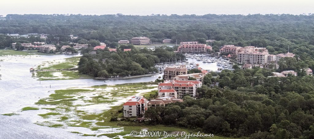 Shelter Cove Harbour & Marina at 1 Shelter Cove Ln on Hilton Head Island, South Carolina aerial view - © 2024 David Oppenheimer - Performance Impressions photography archives - https://performanceimpressions.com Shelter Cove Harbour & Marina, Shelter Cove Harbour & Marina aerial, Shelter Cove, harbor, marina, resort, marsh, marshlands, waterfront, bay, 1 Shelter Cove Ln, boating, yachts, Palmetto Dunes Resort, ocean resort, ocean, Shelter Cove Marina, docking, docks, Palmetto Dunes, Palmetto Dunes Oceanfront Resort, oceanfront, Hilton Head, Hilton Head Island, Hilton Head aerial, Hilton Head Island aerial, Broad Creek, Calibogue Sound, beach, coast, South Carolina coast, coastal, shoreline, shore, aerial, waterfront, dunes, beachfront, estuary, vacation, vacation homes, beach houses, tidal, creek, houses, beach homes, summer, summer homes, residences, properties, Atlantic Ocean, Town of Hilton Head, South Carolina, coastline, coastline aerial, luxury, Lowcountry, Hilton head island real estate, Hilton Head real estate, real estate, Hilton Head aerial, aerial photographer, aerial photography, photography, aerial view, aerial, 29928, David Oppenheimer, David Gordon Oppenheimer, United States, color, horizontal, 1-13726821381,