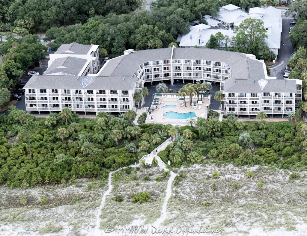 The Breakers Hilton Head oceanfront villas at 4 N Forest Dr on Hilton Head Island, South Carolina aerial view - © 2024 David Oppenheimer - Performance Impressions aerial photography archives - https://performanceimpressions.com The Breakers Hilton Head, The Breakers, 4 North Forest Dr, The Breakers Villas, villas, Coligny Plaza, Breakers Vacation Rentals, pool, building, architecture, villas, condos, apartments, furnished, beach, beach access, coast, South Carolina coast, coastal, shoreline, shore, shoreline aerial, waterfront, dunes, sand, beachfront, sand dunes, resort, vacation, vacation homes, beach houses, houses, beach homes, summer, summer homes, residences, properties, Atlantic Ocean, Hilton Head, Hilton Head Island, Town of Hilton Head, South Carolina, coastline, luxury, Lowcountry, Hilton head island real estate, Hilton Head real estate, real estate, Hilton Head aerial, aerial photographer, aerial photography, photography, aerial view, aerial, 29928, David Oppenheimer, David Gordon Oppenheimer, United States, color, horizontal, 1-13726821381,