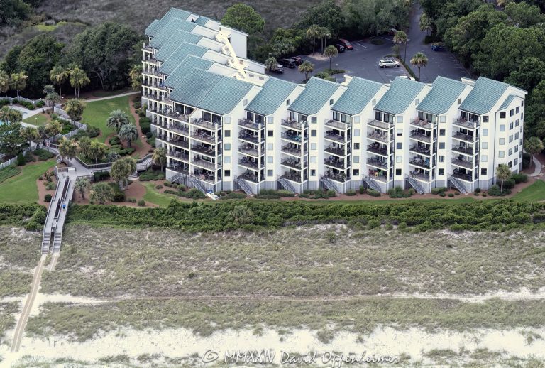 The Sea Cloisters on Hilton Head vacation rentals at 50 Starfish Dr on Hilton Head Island, South Carolina aerial view - © 2024 David Oppenheimer - Performance Impressions aerial photography archives - https://performanceimpressions.com The Sea Cloisters on Hilton Head, Sea Cloisters, 50 Starfish Dr, villas, Folly Field Beach, pool, building, architecture, villas, condos, apartments, furnished, beach, Bradley Beach, Folly Field Beach Park, beach access, coast, South Carolina coast, coastal, shoreline, shore, shoreline aerial, waterfront, dunes, sand, beachfront, sand dunes, resort, vacation, vacation homes, beach houses, houses, beach homes, summer, summer homes, residences, properties, Atlantic Ocean, Hilton Head, Hilton Head Island, Town of Hilton Head, South Carolina, coastline, luxury, Lowcountry, Hilton head island real estate, Hilton Head real estate, real estate, Hilton Head aerial, aerial photographer, aerial photography, photography, aerial view, aerial, 29928, David Oppenheimer, David Gordon Oppenheimer, United States, color, horizontal, 1-13726821381,