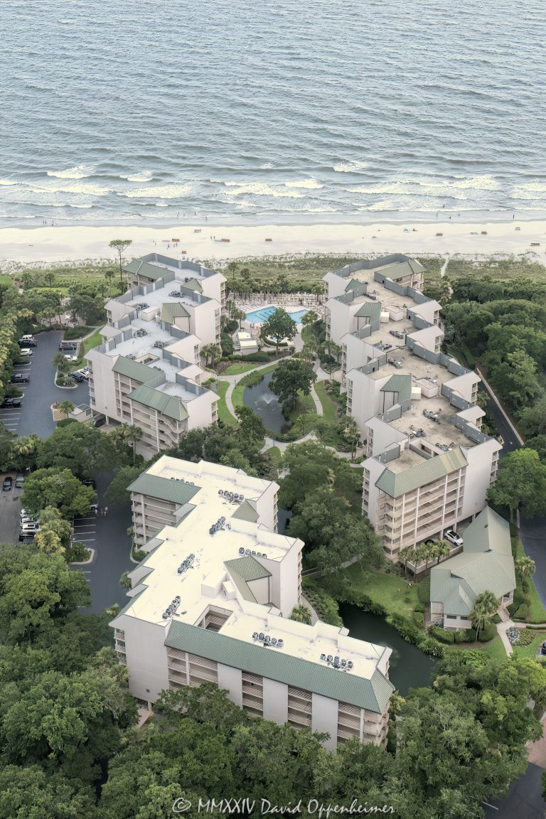 Villamare Resort at Palmetto Dunes villas at 1 Ocean Lane on Hilton Head Island, South Carolina aerial view - © 2024 David Oppenheimer - Performance Impressions aerial photography archives - https://performanceimpressions.com Villamare, Villamare Hilton Head, Villamare Villas, Villamare Resort, Palmetto Dunes, 1 Ocean Lane, vacation rentals, ocean, villas, pool, building, architecture, villas, condos, apartments, furnished, beach, oceanfront, beach access, coast, South Carolina coast, coastal, shoreline, shore, shoreline aerial, waterfront, dunes, sand, beachfront, sand dunes, resort, vacation, vacation homes, beach houses, beach homes, summer, summer homes, residences, properties, Atlantic Ocean, Hilton Head, Hilton Head Island, Town of Hilton Head, coastline, luxury, Lowcountry, Hilton head island real estate, Hilton Head real estate, real estate, Hilton Head aerial, aerial photographer, aerial photography, photography, aerial view, aerial, 29928, David Oppenheimer, David Gordon Oppenheimer, United States, color, vertical, 1-13726821381,