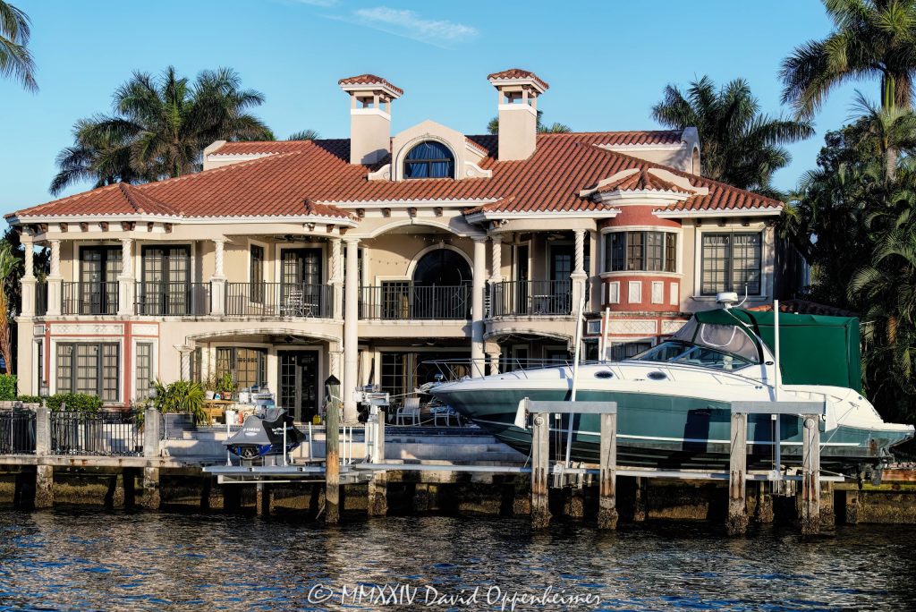 3018 NE 23rd Ct luxury waterfront estate in the Dolphin Isles neighborhood in Fort Lauderdale Florida - © 2024 David Oppenheimer - Performance Impressions photography archives - https://performanceimpressions.com 3018 NE 23rd Ct, Dolphin Isles, Fort Lauderdale, Florida, estate, facade, waterfront, mansion, luxury real estate, real estate, Fort Lauderdale real estate, dock, dockage, home, house, stunning, Intracoastal, Intracoastal Waterway, gated community, community, private community, waterfront estate, private, yacht, boat, Sundancer, Sea Ray, German Platonoff, Spanish chimneys, chimneys, prestigious, bespoke, balcony, balconies, windows, luxury rental, rental, 33305, South Florida, Broward County, neighborhood, security, Las Olas, contemporary, modern, exclusive, property, peninsula, luxury estate, Mediterranean, Mediterranean-style, Spanish-style, terracotta roof, smart home, resort-style, outdoor living, New River, East Fort Lauderdale, architecture, sunset, palm trees, seawall, tropical, grounds, yard, David Oppenheimer, color, horizontal, United States, VAu 1-530-124, 1-13553735171,