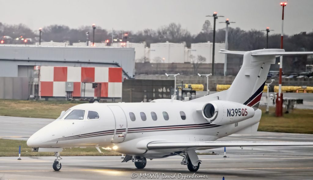 Embraer Phenom 300 jet aircraft N395QS at LaGuardia Airport in New York City - © 2024 David Oppenheimer - Performance Impressions aviation photography archives - https://performanceimpressions.com Embraer Phenom 300, Phenom 300, 300E, Embraer, jet, N395QS, airplane, aircraft, private jet, aviation, airplane, NetJets Aviation, NetJets, NetJets Sales, 1I395, 50500365, LGA, airport, tarmac, taxiing, Embraer Executive Aircraft, fractional jet, fractional, fractional ownership, travel, jetset, New York, KLGA, runway, Queens, New York City, NYC, David Oppenheimer, color, horizontal, United States, 1-13985601741,