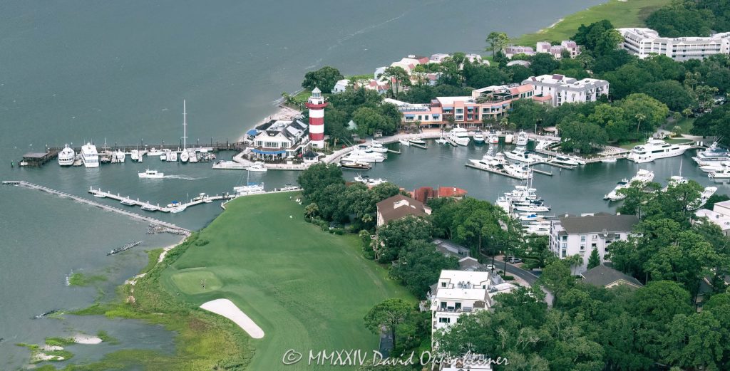 Harbour Town Lighthouse at 149 Lighthouse Road on Hilton Head Island, South Carolina, aerial view © 2024 David Oppenheimer - Performance Impressions aerial photography archives - https://performanceimpressions.com Harbour Town Lighthouse, Harbour Town Lighthouse aerial, lighthouse, Harbour Town, Liberty Oak, Liberty Oak park, park, marina, Harbour Town Marina, Harbour Town Marina aerial, lighthouse, museum, history, Harbour Town aerial, Harbour Town aerial view, Pirates of Hilton Head, Harbour Town Pier, pier, Harbour Town Yacht Basin, 149 Lighthouse Road, Haig Point Water Taxi, docks, water taxi, memorial park, coast, Harbour Town Yacht Club, harbor, yachts, boats, yacht club, Marriott's Harbour Club, Schooner Court Villas, Marriott, Harbour Club, Harbour Town Golf Links, golf, golf course, Vagabond Cruise, sightseeing, shopping, retail, Sea Pines Resort, sea pines, resort, Harbour Town Golf Links, golf, golf course, vacation, Hilton Head, Hilton Head Island, Town of Hilton Head, 29928, South Carolina, Lowcountry, Hilton head island real estate, Hilton Head real estate, real estate, aerial photographer, aerial photography, aerial view, aerial, building, architecture, David Oppenheimer, David Gordon Oppenheimer, United States, color, horizontal, 1-13726821381,