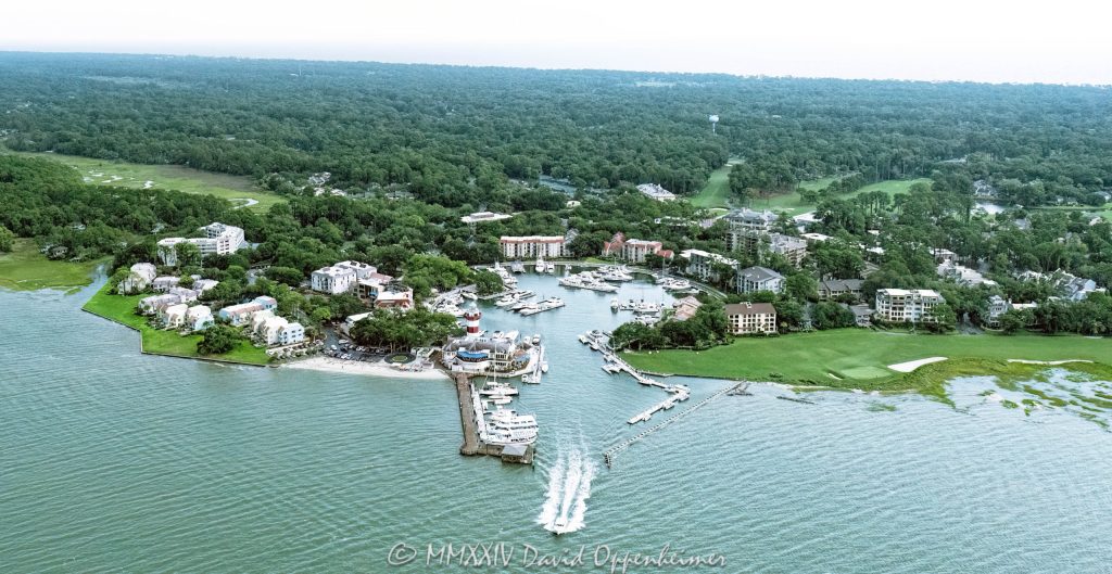 Harbour Town Lighthouse at 149 Lighthouse Road on Hilton Head Island, South Carolina, aerial view © 2024 David Oppenheimer - Performance Impressions aerial photography archives - https://performanceimpressions.com Harbour Town Lighthouse, Harbour Town Lighthouse aerial, lighthouse, Harbour Town, Liberty Oak, Liberty Oak park, park, marina, lighthouse, museum, history, Harbour Town aerial, Harbour Town aerial view, Harbour Town Marina, Harbour Town Marina aerial, Pirates of Hilton Head, Harbour Town Pier, pier, Harbour Town Yacht Basin, 149 Lighthouse Road, Haig Point Water Taxi, docks, water taxi, memorial park, coast, Harbour Town Yacht Club, harbor, yachts, boats, yacht club, Schooner Court Villas, Caravel Court Villas, Ketch Court Villas, Clipper Court Villas, Marriott's Harbour Club, Marriott's Heritage Club, vacation club, Harbour Town Golf Links, golf, golf course, Vagabond Cruise, sightseeing, shopping, retail, Sea Pines Resort, sea pines, resort, Harbour Town Golf Links, golf, golf course, vacation, Hilton Head, Hilton Head Island, Town of Hilton Head, 29928, South Carolina, Lowcountry, Hilton head island real estate, Hilton Head real estate, real estate, aerial photographer, aerial photography, aerial view, aerial, building, architecture, David Oppenheimer, David Gordon Oppenheimer, United States, color, horizontal, 1-13726821381,