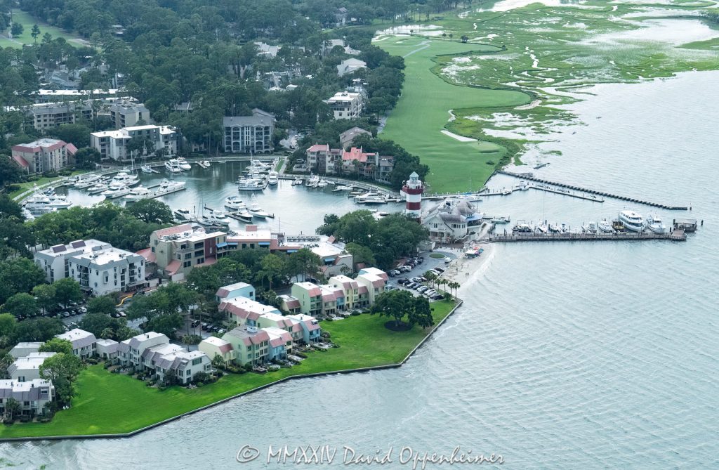 Harbour Town Lighthouse at 149 Lighthouse Road on Hilton Head Island, South Carolina, aerial view © 2024 David Oppenheimer - Performance Impressions aerial photography archives - https://performanceimpressions.com Harbour Town Lighthouse, Harbour Town Lighthouse aerial, lighthouse, Harbour Town, Liberty Oak, Liberty Oak park, park, marina, lighthouse, museum, history, Harbour Town aerial, Harbour Town aerial view, Harbour Town Yacht Basin, Pirates of Hilton Head, Harbour Town Pier, pier, 149 Lighthouse Road, Haig Point Water Taxi, docks, water taxi, memorial park, coast, Harbour Town Yacht Club, harbor, yachts, boats, yacht club, Schooner Court Villas, Caravel Court Villas, Ketch Court Villas, Clipper Court Villas, Marriott's Heritage Club, vacation club, Harbour Town Golf Links, golf, golf course, Vagabond Cruise, sightseeing, shopping, retail, Sea Pines Resort, sea pines, resort, Harbour Town Golf Links, golf, golf course, vacation, Hilton Head, Hilton Head Island, Town of Hilton Head, 29928, South Carolina, Lowcountry, Hilton head island real estate, Hilton Head real estate, real estate, aerial photographer, aerial photography, aerial view, aerial, building, architecture, David Oppenheimer, David Gordon Oppenheimer, United States, color, horizontal, 1-13726821381,