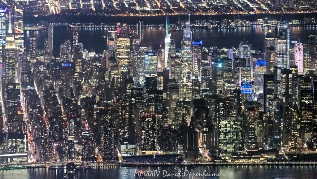 Midtown Manhattan in New York City at night aerial view - © 2024 David Oppenheimer - Performance Impressions aerial photography archives - https://performanceimpressions.com Midtown Manhattan, Midtown, Midtown South, Midtown aerial, buildings, skyscrapers, Midtown Manhattan at night, Midtown Manhattan aerial, Midtown Manhattan real estate, Times Square, Times Square aerial, Madison Square Garden, Madison Square Garden aerial, building, buildings, Penn Plaza, Pennsylvania Plaza, Empire State Building, PENN 1, One Penn Plaza, PENN 2, 2 Pennsylvania Plaza, Pennsylvania Plaza, 7th Ave, Fashion District, Hilton New York Fashion District, TownePlace Suites by Marriott New York, Manhattan, NYC, NYC skyline, 333 7th Ave, Avenue of the Americas, Chelsea, The Capitol Plaza, Chelsea Landmark, 800 Sixth, Herald Square, Macy’s, 325 Fifth Avenue, Beatrice Apartments, Koreatown, Manhattan skyline, NoMad, Broadway, Rose Hill, Kips Bay, Madison House, Midtown real estate, New York City, New York, city, cityscape, skyline, landscape, urban, Midtown South real estate, Manhattan real estate, 10001, 304 W 34th St, W 34th St, art, W 33th St, artwork, fine art photography, fine art, towers, real estate, architecture, aerial photographer, aerial photography, commercial photography, commercial imagery, night, helicopter work, helicopter, Union Square, Madison Square Park, Flatiron District, Chelsea Market, High Line Park, Gramercy Park, Washington Square Park, Greenwich Village, SoHo, NoHo, East Village, West Village, Meatpacking District, Tribeca, aerial, aerial view, aerial photographer, aerial photography, David Oppenheimer, color, horizontal, United States, 1-13985601741,