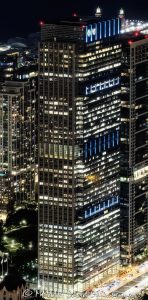Blue Cross Blue Shield Tower at 300 East Randolph Chicago Blue Cross Blue Shield Tower at 300 East Randolph in downtown Chicago, Illinois, located near Millennium Park and Grant Park in the Loop business district. Contemporary commercial skyscraper architecture featuring illuminated office floors, architectural lighting, reflective glass facade design, and dramatic nighttime exterior visibility. The headquarters tower for Health Care Service Corporation was originally designed by Lohan Associates and later vertically expanded by Goettsch Partners. - © 2026 David Oppenheimer - Performance Impressions photography archives https://performanceimpressions.com 300 East Randolph, 300 E Randolph, 300 East Randolph Street, East Randolph Street, Blue Cross Blue Shield Tower, BCBS Tower, Blue Cross Blue Shield Building, Health Care Service Corporation, HCSC, Chicago, Chicago Illinois, Illinois, United States, 60601, Downtown Chicago, Chicago Loop, Millennium Park, Grant Park, architecture, Chicago architecture, architectural photography, urban architecture, modern architecture, contemporary architecture, skyscraper, office tower, high-rise, building, tower, office building, commercial building, corporate tower, corporate headquarters, commercial real estate, corporate real estate, real estate, business district, financial district, commercial architecture, corporate architecture, downtown, urban, glass tower, glass building, glass facade, reflective glass, illuminated building, illuminated windows, office lights, building lights, architectural lighting, nighttime architecture, night photography, night scene, evening light, illuminated facade, lighting design, exterior lighting, reflections, iconic building, American architecture, Illinois architecture, exterior, waterfront, office headquarters, Chicago skyscraper, Chicago office tower, downtown office tower, office architecture, Lohan Associates, Goettsch Partners, Magnusson Klemencic Associates, Blue Cross Blue Shield of Illinois, vertical expansion, commercial photography, commercial imagery, image licensing, licensing, photography licensing, vertical, David Oppenheimer, 1-15156784411