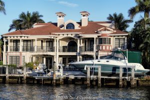 3018 NE 23rd Ct luxury waterfront estate in the Dolphin Isles neighborhood in Fort Lauderdale Florida - © 2024 David Oppenheimer - Performance Impressions photography archives - https://performanceimpressions.com 3018 NE 23rd Ct, Dolphin Isles, Fort Lauderdale, Florida, estate, facade, waterfront, mansion, luxury real estate, real estate, Fort Lauderdale real estate, dock, dockage, home, house, stunning, Intracoastal, Intracoastal Waterway, gated community, community, private community, waterfront estate, private, yacht, boat, Sundancer, Sea Ray, German Platonoff, Spanish chimneys, chimneys, prestigious, bespoke, balcony, balconies, windows, luxury rental, rental, 33305, South Florida, Broward County, neighborhood, security, Las Olas, contemporary, modern, exclusive, property, peninsula, luxury estate, Mediterranean, Mediterranean-style, Spanish-style, terracotta roof, smart home, resort-style, outdoor living, New River, East Fort Lauderdale, architecture, sunset, palm trees, seawall, tropical, grounds, yard, David Oppenheimer, color, horizontal, United States, VAu 1-530-124, 1-13553735171,