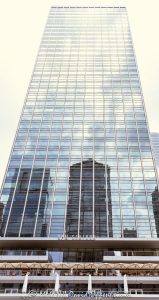 321 North Clark at Riverfront Plaza Chicago 321 North Clark at Riverfront Plaza office tower in Chicago, Illinois, located on the north bank of the Chicago River in the River North business district. Modern commercial high-rise architecture designed by Skidmore, Owings & Merrill featuring a glass and steel exterior, riverfront positioning, and office space within the Riverfront Plaza development. Completed in 1987, the building was formerly known as Quaker Tower and later rebranded as 321 North Clark. - © 2026 David Oppenheimer - Performance Impressions photography archives https://performanceimpressions.com 321 North Clark, 321 North Clark Street, 321 N Clark, North Clark Street, Clark Street, 321 North Clark at Riverfront Plaza, Riverfront Plaza, Quaker Tower, Quaker Building, Chicago, RPM Seafood, Chicago Illinois, Illinois, United States, 60654, Downtown Chicago, River North, Chicago Loop, Chicago River, Chicago riverfront, architecture, Chicago architecture, architectural photography, urban architecture, modern architecture, contemporary architecture, modernist architecture, skyscraper, high-rise, office tower, building, tower, office building, commercial building, corporate tower, corporate headquarters, commercial real estate, corporate real estate, real estate, business district, financial district, commercial architecture, corporate architecture, downtown, urban, riverfront architecture, riverfront tower, riverfront office building, glass tower, glass building, glass facade, steel exterior, glass and steel, facade, building exterior, reflections, iconic building, American architecture, Illinois architecture, exterior, daylight, waterfront, financial center, business center, Class A office building, Chicago skyscraper, Chicago office tower, downtown office tower, commercial tower, office architecture, River North architecture, Loop district, riverfront plaza, public space, Skidmore Owings Merrill, Skidmore Owings and Merrill, SOM, Hines, BCE Development Properties, PCL Construction, American Bar Association, Quaker Oats, commercial photography, commercial imagery, image licensing, licensing, photography licensing, David Oppenheimer, vertical, 1-15156784411