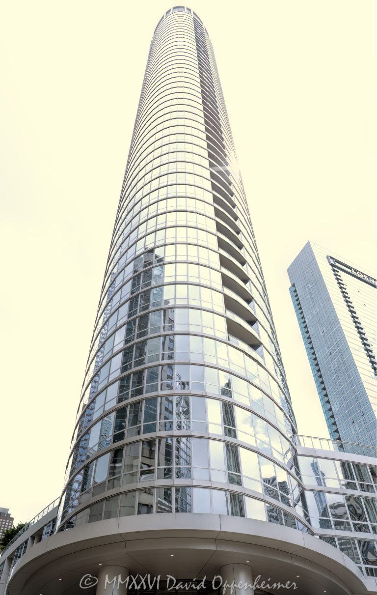 465 North Park luxury apartment tower in Chicago, Illinois, located in the Streeterville neighborhood near Navy Pier and the Chicago lakefront. Contemporary residential high-rise architecture designed by Pappageorge Haymes Partners featuring a curved glass facade, balconies, retail space, and a four-story podium. The 48-story rental apartment building was developed by Jupiter Realty with MetLife and Allstate, and completed in 2018 – © 2026 David Oppenheimer – Performance Impressions photography archives https://performanceimpressions.com 465 North Park, 465 North Park Drive, 465 N Park, 465 N Park Drive, North Park Drive, Park Drive, Streeterville, Chicago, Chicago Illinois, Illinois, United States, 60611, Downtown Chicago, Chicago Loop, Navy Pier, Lake Michigan, Chicago lakefront, architecture, Chicago architecture, architectural photography, urban architecture, modern architecture, contemporary architecture, residential architecture, apartment tower, apartment building, rental apartments, luxury apartments, residential tower, residential building, high-rise, skyscraper, building, tower, glass tower, glass building, glass facade, curved glass, curved facade, curtain wall, balconies, balcony, podium, retail space, mixed-use building, residential real estate, apartment real estate, Chicago real estate, real estate, downtown apartments, Streeterville apartments, Chicago apartments, luxury rentals, urban living, city living, commercial architecture, downtown, urban, iconic building, American architecture, Illinois architecture, exterior, daylight, waterfront, business district, residential high-rise, multifamily housing, Pappageorge Haymes, Pappageorge Haymes Partners, Jupiter Realty, MetLife, Allstate, Power Construction, LEED Gold, commercial photography, commercial imagery, image licensing, licensing, photography licensing, David Oppenheimer, facade, vertical, 1-15156784411
