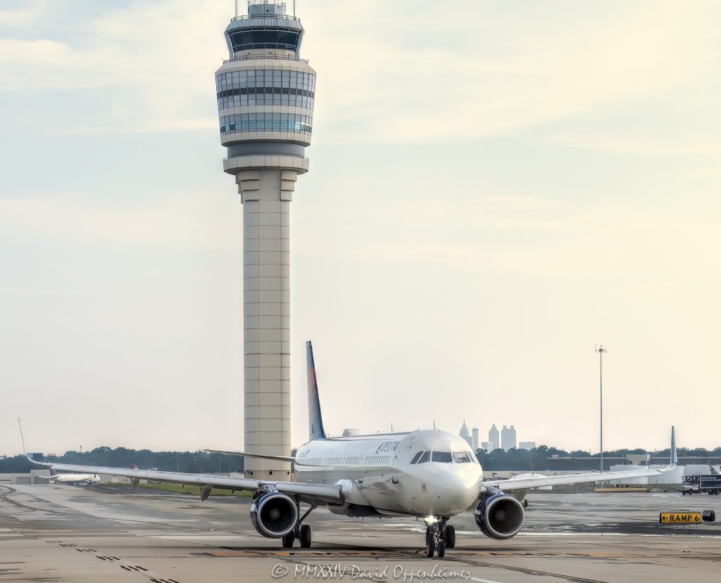 Air traffic control tower at Hartsfield-Jackson Atlanta International Airport in Atlanta, Georgia - © 2024 David Oppenheimer - Performance Impressions aviation photography archives - https://performanceimpressions.com air traffic control, ATC, ATC tower, control tower, tower, ATL, Delta, Delta Air Lines, DAL, plane, Hartsfield-Jackson Atlanta International Airport, Hartsfield-Jackson, KATL, airspace, aviation, aircraft, guidance, air traffic, transportation, airport, airport traffic, Atlanta Tower, radar, ground control, GMC, approach control, approach, terminal, route, control, collision avoidance, weather, runway, navigation, safety, airlines, Ramp 6, IFR, Atlanta, Georgia, tallest, tall, Clayton County, David Oppenheimer, color, horizontal, United States, 1-13726821381