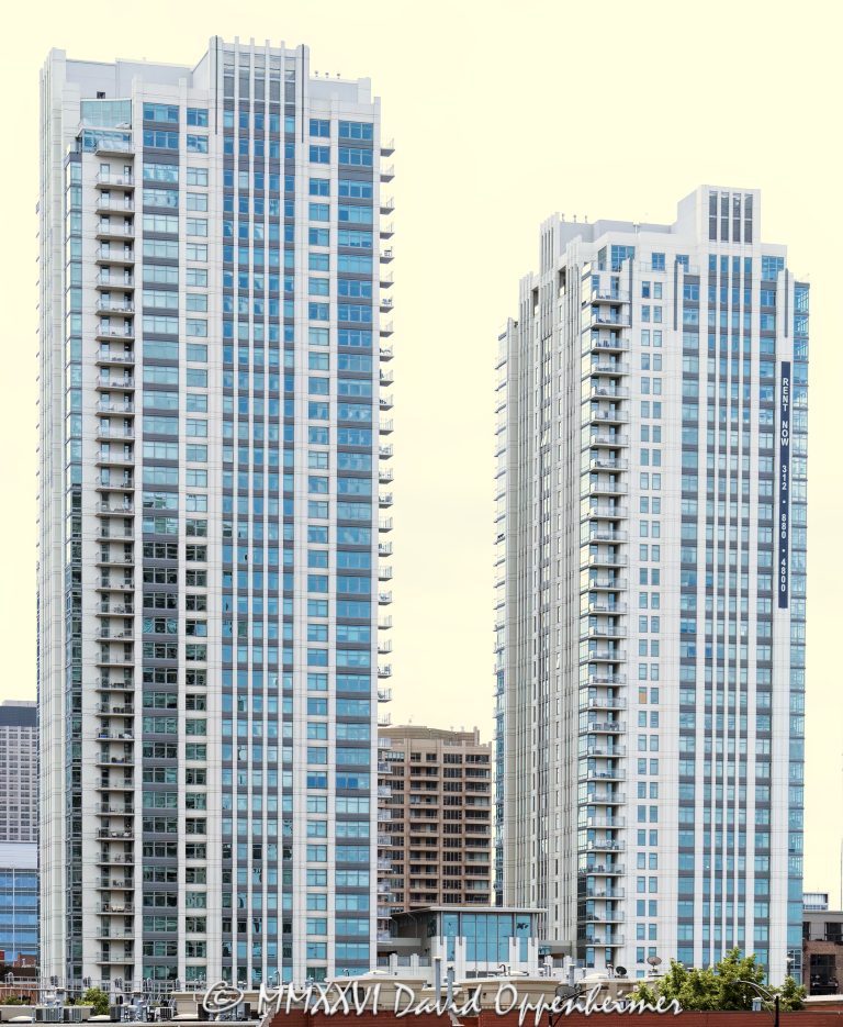 150 North Riverside Plaza oAlta at K Station apartment towers in Chicago, Illinois, located at 555 West Kinzie Street in the Fulton River District between River North and the West Loop. Contemporary residential high-rise architecture by Pappageorge Haymes Partners featuring two modern rental apartment towers, glass facade design, balconies, and downtown residential positioning near the Chicago River. The luxury apartment complex was developed by Fifield Companies and completed in 2010 – © 2026 David Oppenheimer – Performance Impressions photography archives https://performanceimpressions.com Alta Chicago, Alta at K Station, Alta Apartments, Alta apartment towers, Alta rental apartments, Alta Chicago apartments, 555 West Kinzie, 555 West Kinzie Street, 555 W Kinzie, West Kinzie Street, Kinzie Street, Chicago, Chicago Illinois, Illinois, United States, 60654, Downtown Chicago, Fulton River District, River North, West Loop, Chicago Loop, Chicago River, architecture, Chicago architecture, architectural photography, facade, building exterior, exterior, residential architecture, modern architecture, contemporary architecture, urban architecture, apartment tower, apartment building, rental apartments, luxury apartments, residential tower, residential building, two-tower complex, high-rise, skyscraper, building, tower, glass tower, glass building, glass facade, reflective glass, curtain wall, balconies, balcony, podium, retail space, residential real estate, apartment real estate, Chicago real estate, real estate, downtown apartments, River North apartments, West Loop apartments, Chicago apartments, luxury rentals, urban living, city living, mixed-use building, commercial architecture, downtown, urban, iconic building, American architecture, Illinois architecture, daylight, multifamily housing, Pappageorge Haymes Partners, Pappageorge Haymes, Fifield Companies, McHugh Construction, commercial photography, commercial imagery, image licensing, licensing, photography licensing, David Oppenheimer, vertical, 1-15156784411