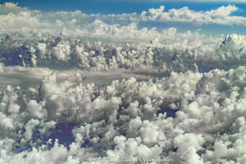 Altocumulus Castellanus Clouds Aerial View Altocumulus castellanus clouds seen from altitude in a scenic aerial view, with silver linings and dramatic light patterns forming towering structures across the sky. The perspective highlights the grandeur and beauty of these rare cloud formations. - © 2025 David Oppenheimer - Performance Impressions aerial photography archives - https://performanceimpressions.com Altocumulus castellanus, Altocumulus, castellanus, aerial, aerial view, aerial photography, aerial photo, aerial photographer, photographer, clouds, cloudscape, altitude, sky, dramatic clouds, silver linings, scenic sky, weather, meteorology, atmosphere, formation, horizon, landscape, nature, majestic, monumental, ethereal, breathtaking, awe, wonder, surreal, dramatic light, atmospheric, moody sky, daytime sky, high altitude, photography, United States, horizontal, color, 1-14993092111