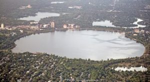 Bde Maka Ska Lake in Minneapolis, Minnesota aerial view - © 2024 David Oppenheimer - Performance Impressions aerial photography archives - https://performanceimpressions.com Bde Maka Ska, Bde Maka Ska aerial, Bde Maka Ska lake, lake, Lake Calhoun, Lake Calhoun aerial, Lake Calhoun real estate, Chain of Lakes, park, city park, real estate, waterfront, lakefront, beaches, boating, Grand Rounds National Scenic Byway, Hennepin County, Minnesota, Jo Pond, Berry Park, East Bde Maka Ska, Linden Hills, Uptown, Lake Point, water, aerial, aerial photographer, aerial photography, United States, color, horizontal, David Oppenheimer, 1-13985601741,