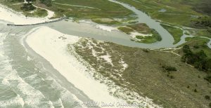 Burkes Beach on Hilton Head Island in South Carolina aerial view - © 2024 David Oppenheimer - Performance Impressions aerial photography archives - https://performanceimpressions.com Burkes Beach, beach, public beach, beach access, beachfront, ocean, waves, dunes, sand, sand dunes, beachgrass, tide, tidal pools, tidal flats, marine, tidal inlet, coastal inlet, inlet, tidal creek, creek, marsh, salt marsh, saltmarsh, sediment, mudflats, habitat, marshland, ecology, estuary, estuarine, Hilton Head, Hilton Head Island, Town of Hilton Head, South Carolina, Lowcountry, aerial photographer, aerial photography, aerial view, aerial, David Oppenheimer, David Gordon Oppenheimer, United States, 29928, color, horizontal, 1-13726821381,