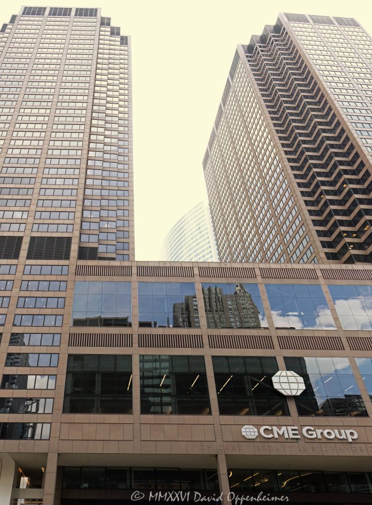 CME Group Building at 20 South Wacker Drive in Chicago, Illinois, located on South Wacker Drive in the Loop financial district near the Chicago River. Postmodern commercial office complex associated with CME Center and the Chicago Mercantile Exchange, featuring twin towers, granite exterior elements, solar-gray glass, and a modernized Wacker Drive lobby. The 40-story tower complex is home to CME Group’s global headquarters and is also known as the Chicago Mercantile Exchange Building – © 2026 David Oppenheimer – Performance Impressions photography archives https://performanceimpressions.com CME Group Building, CME Center, Chicago Mercantile Exchange Building, Chicago Mercantile Exchange, CME Group, CME, Chicago Merc, The Merc, 20 South Wacker, 20 South Wacker Drive, 20 S Wacker, 30 South Wacker, 30 South Wacker Drive, 30 S Wacker, South Wacker Drive, Wacker Drive, Chicago, Chicago Illinois, Illinois, United States, 60606, Downtown Chicago, Chicago Loop, Loop, financial district, Chicago River, Chicago riverfront, architecture, Chicago architecture, architectural photography, facade, building exterior, exterior, postmodern architecture, modern architecture, commercial architecture, corporate architecture, office architecture, office tower, office building, commercial building, building, tower, high-rise, twin towers, glass tower, glass building, glass facade, granite exterior, solar-gray glass, reflective glass, curtain wall, lobby, modern lobby, financial exchange, futures exchange, commodities exchange, derivatives exchange, trading, trading floor, financial markets, business district, downtown, urban, commercial real estate, corporate real estate, real estate, financial center, business center, Class A office building, Chicago office tower, downtown office tower, Skidmore Owings Merrill, SOM, Fujikawa Johnson, Fujikawa Johnson Gobel, Krueck Sexton Partners, Tishman Speyer, commercial photography, commercial imagery, image licensing, licensing, photography licensing, art, print, fine art, David Oppenheimer, vertical, 1-15156784411
