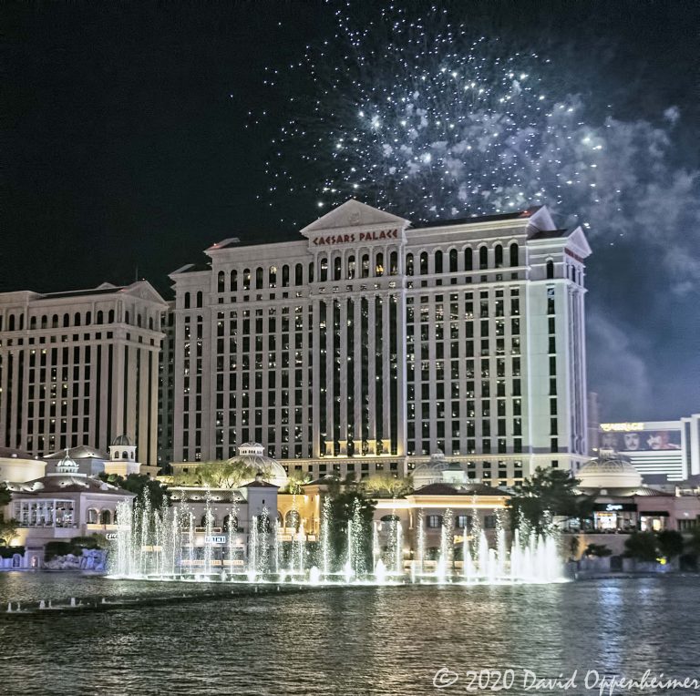 Las Vegas at Night w. Fountains at Bellagio and Caesars Palace Fireworks