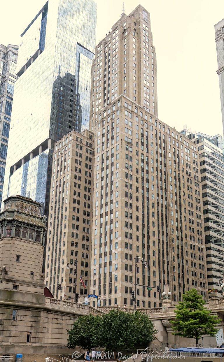 Chicago City Hall and the City Hall-County Building at 121 North LaSalle Street in Chicago, Illinois, located in the Loop civic and financial district. Historic Classical Revival municipal architecture designed by Holabird & Roche featuring a granite facade, large classical columns, and government offices for the City of Chicago and Cook County. The shared City Hall-County Building was completed in phases between 1908 and 1911 and designated a Chicago Landmark in 1982 – © 2026 David Oppenheimer – Performance Impressions photography archives https://performanceimpressions.com Chicago City Hall, City Hall-County Building, City Hall County Building, Chicago City Hall Building, Cook County Building, Cook County government, City of Chicago, Chicago municipal building, Chicago government building, Chicago civic building, 121 North LaSalle, 121 North LaSalle Street, 121 N LaSalle, North LaSalle Street, LaSalle Street, 118 North Clark, 118 North Clark Street, 118 N Clark, Clark Street, Chicago, Chicago Illinois, Illinois, United States, 60602, Downtown Chicago, Chicago Loop, Loop, financial district, civic district, architecture, Chicago architecture, architectural photography, facade, building exterior, exterior, historic architecture, Classical Revival, Classical Revival architecture, neoclassical architecture, municipal architecture, civic architecture, government building, city hall, county building, courthouse building, office building, building, granite facade, stone facade, classical facade, columns, classical columns, Corinthian columns, colonnade, public building, landmark building, Chicago Landmark, historic building, American architecture, Illinois architecture, daylight, downtown, urban, financial center, business center, civic center, Holabird Roche, Holabird & Roche, Holabird and Roche, Holabird Root, Holabird & Root, Chicago City Council, Mayor of Chicago, Cook County Board, Daley Plaza, commercial photography, commercial imagery, image licensing, licensing, photography licensing, David Oppenheimer, vertical, 1-15156784411