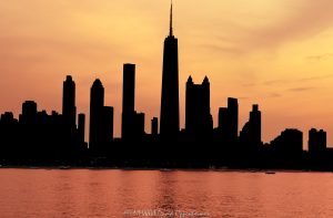 Chicago Gold Coast Lakefront Skyline Silhouette at Sunset Chicago Gold Coast lakefront skyline silhouette at sunset from Lake Michigan, with Near North Side towers rising in dark profile against a fire-orange sky. The glowing lake surface reflects the post-sunset color as high-rises along North Michigan Avenue and North Lake Shore Drive frame the Chicago, Illinois lakefront – © 2026 David Oppenheimer – Performance Impressions photography archives https://performanceimpressions.com Chicago skyline silhouette, Chicago skyline, Chicago cityscape, cityscape, Chicago sunset, Gold Coast skyline, Lake Michigan, Chicago lakefront, Chicago waterfront, Chicago coastline, Chicago coast, skyline sunset, sunset skyline, orange sky, fire orange sky, orange sunset, sunset glow, glowing sky, glowing water, lake reflection, orange reflection, silhouetted skyline, building silhouettes, tower silhouettes, sunset silhouette, skyline art, Chicago art, Chicago photography, downtown Chicago, Near North Side, Gold Coast, Gold Coast Chicago, Streeterville, Magnificent Mile, Mag Mile, North Michigan Avenue, Michigan Avenue, North Lake Shore Drive, DuSable Lake Shore Drive, Oak Street Beach, Rush Street, Division Street, Rush and Division, Chicago, Chicago Illinois, Chicago IL, Illinois, 60611, skyline, urban skyline, cityscape, landscape, urban landscape, lake, water, lakefront, waterfront, coast, coastline, shoreline, horizon, sunset, dusk, twilight, after sunset, evening, evening light, clouds, cloudscape, architecture, buildings, skyscrapers, towers, high rise, office towers, residential towers, hotel towers, condominiums, apartments, hotels, mixed use, real estate, Chicago real estate, Gold Coast real estate, lakefront real estate, waterfront real estate, commercial real estate, residential real estate, 875 North Michigan Avenue, 875 N Michigan Avenue, 360 Chicago, 360 Chicago Observation Deck, John Hancock Center, former John Hancock Center, Water Tower Place, 835 North Michigan Avenue, 835 N Michigan Avenue, The Ritz-Carlton Chicago, Park Tower, Park Tower Chicago, 800 North Michigan Avenue, 800 N Michigan Avenue, Park Hyatt Chicago, Olympia Centre, Olympia Center, 737 North Michigan Avenue, 737 N Michigan Avenue, 900 North Michigan, 900 North Michigan Avenue, 900 North Michigan Shops, Bloomingdale’s, Bloomingdale’s Chicago, Four Seasons Hotel Chicago, Four Seasons, 132 East Delaware Residences, One Magnificent Mile, One Mag Mile, 950 North Michigan Avenue, 950 N Michigan Avenue, 1000 Lake Shore Plaza, 1000 N Lake Shore Plaza, The Carlyle, 1040 North Lake Shore Drive, 1040 N Lake Shore Drive, 1110 North Lake Shore Drive, 1110 N Lake Shore Drive, 1120 North Lake Shore Drive, 1120 N Lake Shore Drive, Skidmore Owings Merrill, SOM, Bruce Graham, Fazlur Rahman Khan, Kohn Pedersen Fox, KPF, Perkins Will, Lucien Lagrange, DeStefano Partners, Edward D Dart, Loebl Schlossman Bennett Dart, Robert DeGolyer, skyline photography, cityscape photography, landscape photography, architectural photography, sunset photography, lakefront photography, Chicago skyline art, Chicago cityscape art, sunset art, landscape art, wall art, art print, Chicago print, skyline print, fine art print, travel, tourism, destination, United States, licensing, image licensing, commercial imagery, photography licensing, art, print, fine art, commercial photography, David Oppenheimer, horizontal, 1-15213827141