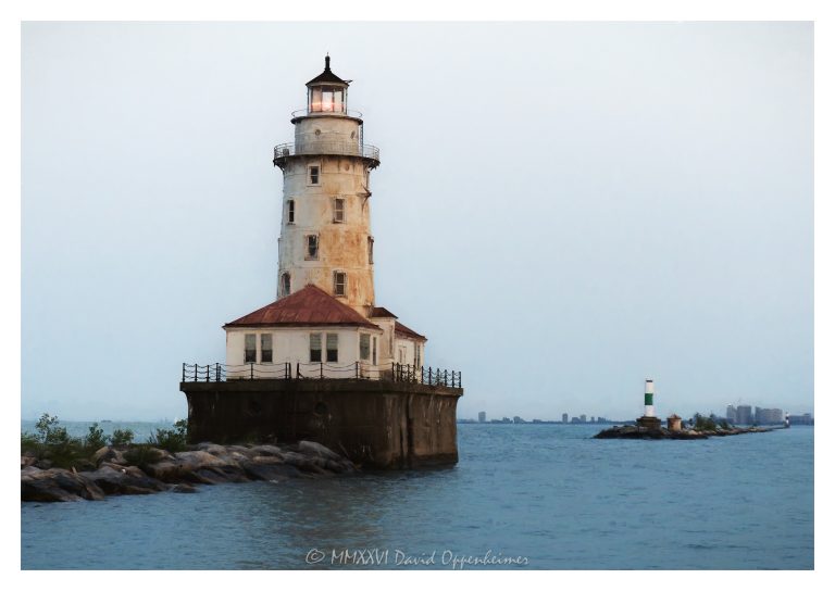 Chicago Harbor Lighthouse is photographed from close range on Lake Michigan at the Chicago Harbor entrance in Chicago, Illinois. Visible features include the white conical cast-iron tower, red-roofed fog-signal room and boathouse, stone-faced pier, North Breakwater, and the east breakwater across the entrance channel in subtle sunset light. Built in 1893, the tower was moved to its present site and reconstructed in 1917–18. Chicago Harbor Light remains an active aid to navigation, is designated a Chicago Landmark, and is listed on the National Register of Historic Places – © 2026 David Oppenheimer – Performance Impressions photography archives https://performanceimpressions.com Chicago Harbor Lighthouse, Chicago Harbor Light, Chicago Harbor, Chicago Breakwater Light, Lake Michigan lighthouse, Chicago lighthouse, Illinois lighthouse, Great Lakes lighthouse, Chicago Harbor entrance, Chicago Harbor entrance channel, Chicago Harbor breakwater, North Breakwater, east breakwater, Lake Michigan, Great Lakes, Chicago, Chicago Illinois, Illinois, Chicago lakefront, lighthouse, harbor lighthouse, breakwater lighthouse, offshore lighthouse, historic lighthouse, aid to navigation, navigation light, navigation, maritime navigation, beacon, conical tower, cast iron tower, white lighthouse, red roofs, lantern room, fog signal room, boathouse, stone pier, breakwater, harbor entrance, entrance channel, maritime, lighthouse architecture, harbor infrastructure, U.S. Lighthouse Board, U.S. Coast Guard, Chicago Landmark, National Register of Historic Places, NRHP, maritime history, sunset, United States, editorial photography, Licensing, image licensing, commercial imagery, photography licensing, art, print, fine art, commercial photography, Performance Impressions, photography archives, David Oppenheimer, 1-15213827141