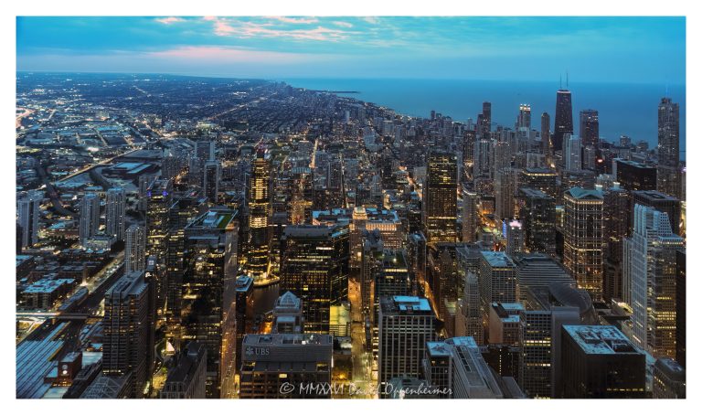 Chicago skyline and city lights at night from Willis Tower in Chicago, Illinois, looking north across downtown toward the Gold Coast, Streeterville, River North, and the Near North Side. Night aerial-style view from the former Sears Tower showing the Chicago Loop, financial district, West Loop Gate, Chicago River, high-rise buildings, illuminated streets, and downtown neighborhoods – © 2026 David Oppenheimer – Performance Impressions aerial photography archives https://performanceimpressions.com Chicago skyline, Chicago skyline at night, Chicago city lights, city lights, night skyline, nighttime skyline, Chicago at night, downtown Chicago, Chicago downtown, Chicago Loop, Loop, financial district, West Loop Gate, West Loop, Near North Side, River North, Streeterville, Gold Coast, Magnificent Mile, Michigan Avenue, Chicago River, Chicago Riverwalk, Lake Michigan, Chicago lakefront, skyline, cityscape, Chicago cityscape, aerial, aerial photo, aerial photography, aerial photographer, aerial view, aerial image, night aerial, nighttime aerial, night photography, night photo, city at night, urban night, illuminated city, illuminated streets, street lights, building lights, high-rise, high-rises, skyscraper, skyscrapers, building, tower, architecture, Chicago architecture, urban architecture, modern architecture, contemporary architecture, downtown skyline, urban skyline, office towers, residential towers, condo towers, hotel towers, glass towers, glass buildings, city from above, Willis Tower, Sears Tower, former Sears Tower, Skydeck Chicago, 233 South Wacker, 233 South Wacker Drive, 233 S Wacker, South Wacker Drive, Wacker Drive, North Michigan Avenue, urban planning, city planning, travel photography, tourism, destination, Midwest city, Midwest skyline, Illinois, Chicago Illinois, United States, commercial photography, commercial imagery, image licensing, licensing, photography licensing, art, print, fine art, David Oppenheimer, horizontal, 1-15156784411
