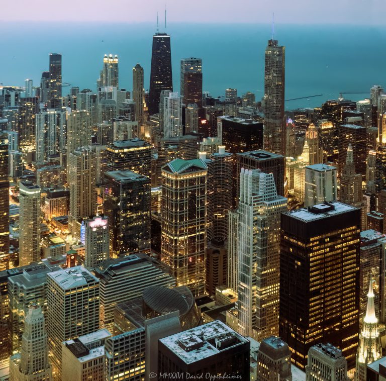 Chicago skyline and city lights at night from Willis Tower in Chicago, Illinois, looking north across downtown toward the Magnificent Mile, Gold Coast, and 875 North Michigan Avenue. Elevated nighttime view from the former Sears Tower showing the Chicago Loop, Richard J. Daley Center at 50 West Washington Street, North Michigan Avenue, 900 North Michigan Shops, 360 Chicago, high-rise buildings, illuminated streets, and downtown neighborhoods – © 2026 David Oppenheimer – Performance Impressions aerial photography archives https://performanceimpressions.com Chicago skyline, Chicago skyline at night, Chicago city lights, city lights, night skyline, nighttime skyline, Chicago at night, downtown Chicago, Chicago downtown, Chicago Loop, Loop, financial district, Magnificent Mile, North Michigan Avenue, Michigan Avenue, Gold Coast, Near North Side, River North, Streeterville, 875 North Michigan Avenue, 875 North Michigan, John Hancock Center, former John Hancock Center, 360 Chicago, 360 Chicago Observation Deck, 900 North Michigan, 900 North Michigan Avenue, 900 North Michigan Shops, 50 West Washington, 50 West Washington Street, Richard J. Daley Center, Daley Center, Chicago River, Chicago Riverwalk, Lake Michigan, Chicago lakefront, skyline, cityscape, Chicago cityscape, aerial, aerial photo, aerial photography, aerial photographer, aerial view, aerial image, night aerial, nighttime aerial, night photography, night photo, city at night, urban night, illuminated city, illuminated streets, street lights, building lights, high-rise, high-rises, skyscraper, skyscrapers, building, tower, architecture, Chicago architecture, urban architecture, modern architecture, contemporary architecture, downtown skyline, urban skyline, office towers, residential towers, condo towers, hotel towers, glass towers, glass buildings, city from above, Willis Tower, Sears Tower, former Sears Tower, Skydeck Chicago, 233 South Wacker, 233 South Wacker Drive, 233 S Wacker, Illinois, Chicago Illinois, United States, licensing, image licensing, commercial imagery, photography licensing, art, print, fine art, commercial photography, David Oppenheimer, horizontal, 1-15156784411
