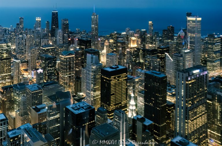 Chicago skyline and city lights at night from Willis Tower in Chicago, Illinois, looking north across downtown toward the Magnificent Mile, Gold Coast, and 875 North Michigan Avenue. Elevated nighttime view from the former Sears Tower showing the Chicago Loop, Richard J. Daley Center at 50 West Washington Street, North Michigan Avenue, 900 North Michigan Shops, 360 Chicago, high-rise buildings, illuminated streets, and downtown neighborhoods – © 2026 David Oppenheimer – Performance Impressions aerial photography archives https://performanceimpressions.com Chicago skyline, Chicago skyline at night, Chicago city lights, city lights, night skyline, nighttime skyline, Chicago at night, downtown Chicago, Chicago downtown, Chicago Loop, Loop, financial district, Magnificent Mile, North Michigan Avenue, Michigan Avenue, Gold Coast, Near North Side, River North, Streeterville, 875 North Michigan Avenue, 875 North Michigan, John Hancock Center, former John Hancock Center, 360 Chicago, 360 Chicago Observation Deck, 900 North Michigan, 900 North Michigan Avenue, 900 North Michigan Shops, 50 West Washington, 50 West Washington Street, Richard J. Daley Center, Daley Center, Chicago River, Chicago Riverwalk, Lake Michigan, Chicago lakefront, skyline, cityscape, Chicago cityscape, aerial, aerial photo, aerial photography, aerial photographer, aerial view, aerial image, night aerial, nighttime aerial, night photography, night photo, city at night, urban night, illuminated city, illuminated streets, street lights, building lights, high-rise, high-rises, skyscraper, skyscrapers, building, tower, architecture, Chicago architecture, urban architecture, modern architecture, contemporary architecture, downtown skyline, urban skyline, office towers, residential towers, condo towers, hotel towers, glass towers, glass buildings, city from above, Willis Tower, Sears Tower, former Sears Tower, Skydeck Chicago, 233 South Wacker, 233 South Wacker Drive, 233 S Wacker, Illinois, Chicago Illinois, United States, licensing, image licensing, commercial imagery, photography licensing, art, print, fine art, commercial photography, David Oppenheimer, horizontal, 1-15156784411