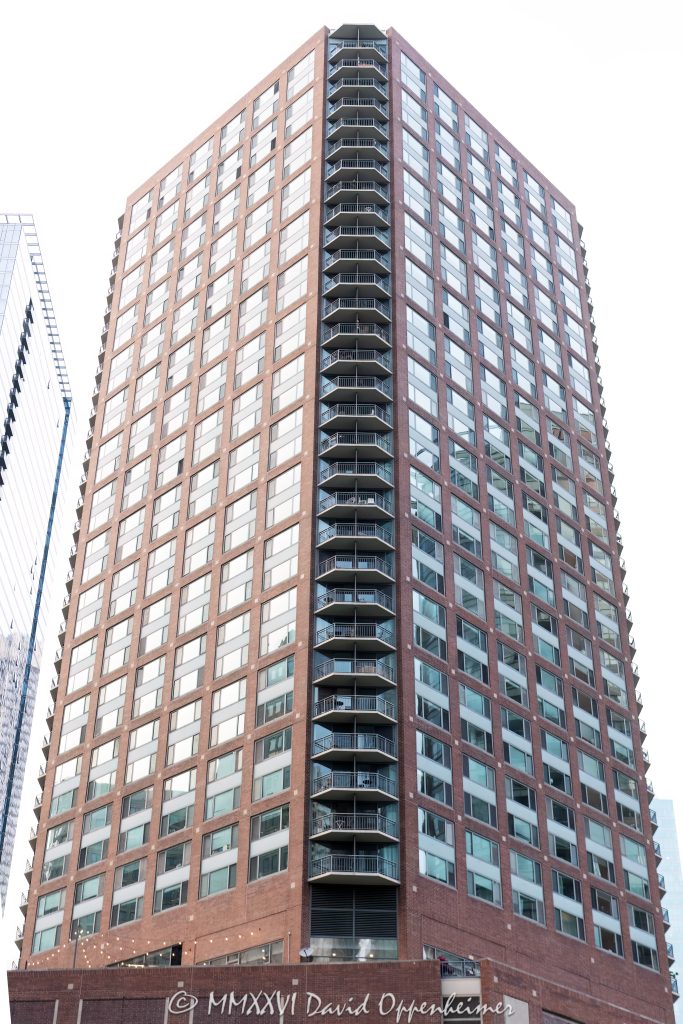 Cityfront Place Apartments at 400 North McClurg Court in Chicago, Illinois, shown in a vertical exterior view of the 39-story Streeterville rental high-rise and its riverfront tower profile. Designed by Gelick Foran & Associates and developed by The Habitat Company, with McHugh Construction as general contractor, the apartment tower stands near the Chicago Riverwalk, Navy Pier, Lake Michigan and the Magnificent Mile – © 2026 David Oppenheimer – Performance Impressions photography archives https://performanceimpressions.com Cityfront Place Apartments, Cityfront Place, Cityfront Center Apartments, Cityfront Center, 400 North McClurg Court, 400 N McClurg Court, 400 N McClurg Ct, North McClurg Court, McClurg Court, Streeterville, Streeterville Chicago, Near North Side, downtown Chicago, Chicago, Chicago Illinois, Chicago IL, Illinois, 60611, Chicago River, Chicago Riverwalk, Riverwalk, riverfront, waterfront, lakefront, Lake Michigan, Navy Pier, Magnificent Mile, Mag Mile, East North Water Street, North Water Street, East Illinois Street, Illinois Street, Ogden Slip, River East, River Esplanade Park, Centennial Fountain, facade, building exterior, exterior, tower exterior, high rise, high-rise, apartment tower, residential tower, rental tower, riverfront tower, multifamily tower, apartment building, residential building, apartments, rental apartments, luxury apartments, Streeterville apartments, Chicago apartments, Chicago rentals, downtown apartments, urban apartments, multifamily, multifamily housing, residential real estate, apartment real estate, Chicago real estate, riverfront real estate, lakefront real estate, commercial real estate, real estate, architecture, architectural photography, Chicago architecture, residential architecture, high-rise architecture, glass facade, balconies, tower, building, skyline views, river views, city views, 39 story tower, 480 units, Gelick Foran Associates, Gelick Foran & Associates, Gelick Foran, The Habitat Company, Habitat Company, McHugh Construction, James McHugh Construction, Willow Bridge Property Company, Willow Bridge, Strategic Properties of North America, SPNA, Mirae Asset Securities, Newmark, Streeterville real estate, Near North Side real estate, Chicago River real estate, tourism, travel, destination, United States, licensing, image licensing, commercial imagery, photography licensing, art, print, fine art, commercial photography, David Oppenheimer, vertical, 1-15213827141