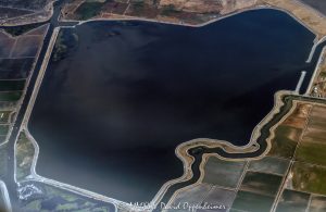 Clifton Court Forebay reservoir in Discovery Bay, California aerial view - © 2024 David Oppenheimer - Performance Impressions aerial photography archives - https://performanceimpressions.com Clifton Court Forebay, Clifton Court Forebay aerial, Clifton Court, forebay, Discovery Bay, California, farmland, agribusiness, agriculture, farming, fields, crops, irrigation, reservoir, San Joaquin River Delta, river delta, estuary, San Joaquin, San Joaquin River, Central Valley, confluence, National Heritage Area, delta, islands, water, water system, Northern California, California Aqueduct, wetlands, wetland, freshwater, drinking water, aerial photographer, aerial photography, United States, color, horizontal, David Oppenheimer, 1-13985601741,