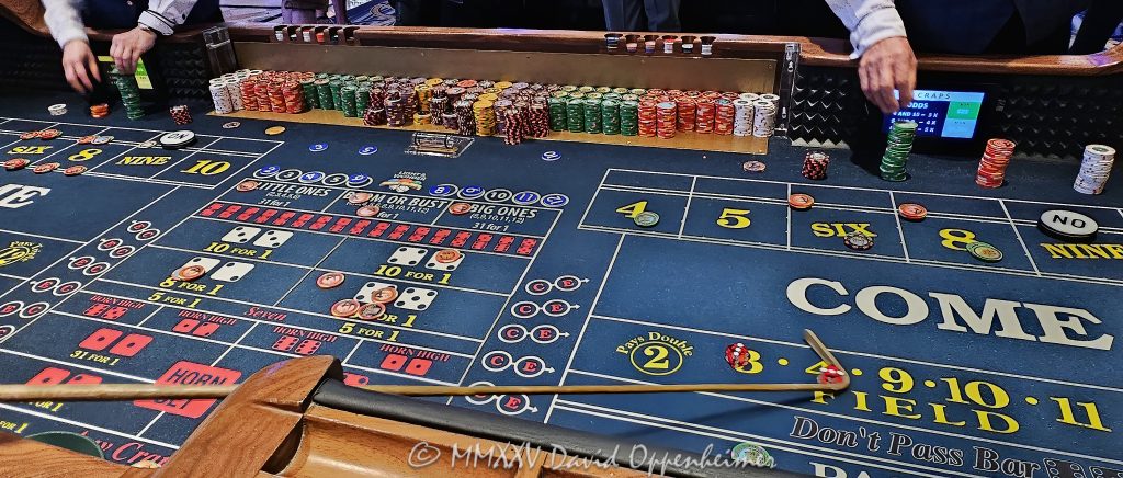 Craps Table Gambling at The Venetian Casino in Las Vegas Craps table gambling at The Venetian casino in Las Vegas, Nevada - © 2025 David Oppenheimer - Performance Impressions travel photography archives - https://performanceimpressions.com The Venetian, casino, Las Vegas, craps, craps table, dice, chips, casino chips, money, roll of the dice, roll the dice, dice game, roll, table, gaming, play, Nevada, odds, win, gambling, wager, bet, luck, gamble, resort, 3355 S Las Vegas Blvd, 89109, United States, horizontal, color, 1-14977862771