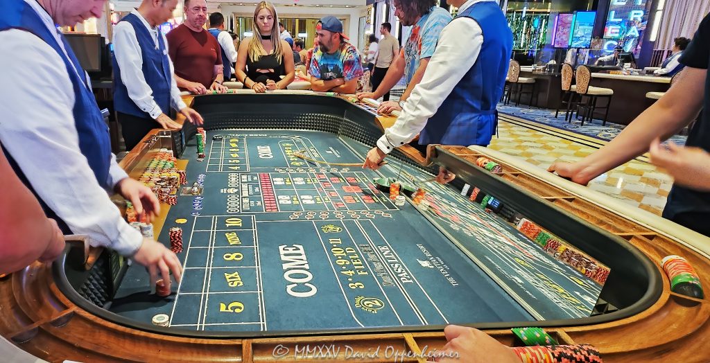 Craps Table Gambling at The Venetian Casino in Las Vegas Craps table gambling at The Venetian casino in Las Vegas, Nevada - © 2025 David Oppenheimer - Performance Impressions travel photography archives - https://performanceimpressions.com The Venetian, casino, Las Vegas, craps, craps table, dice, chips, casino chips, money, roll of the dice, roll the dice, dice game, roll, table, gaming, play, Nevada, odds, win, gambling, wager, bet, luck, gamble, resort, 3355 S Las Vegas Blvd, 89109, United States, horizontal, color, 1-14977862771