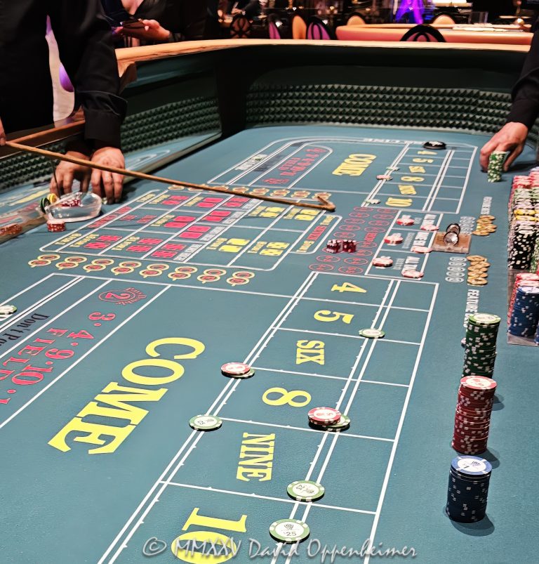 Craps table at Wynn Las Vegas Resort and Casino in Las Vegas, Nevada - © 2025 David Oppenheimer - Performance Impressions casino photography archives - https://performanceimpressions.com craps, craps table, Wynn Casino, casino, Wynn craps table, dice, chips, casino chips, gaming, play, betting, odds, win, gambling, wager, bet, luck, gamble, 3355 S Las Vegas Blvd, 89109, Wynn, Encore, Encore Las Vegas, Encore Resort, Encore Casino, Encore Vegas, Encore at Wynn, Wynn Las Vegas, Wynn Vegas, Wynn Resort, Wynn Resorts, 3131 Las Vegas Blvd S, 89109, hotel, resort, building, architecture, shops, shopping, bridge, night, lights, city lights, WYNN, WYNN stock, five star, luxury, Las Vegas, Vegas, Las Vegas Strip, table game, dice game, casino floor, entertainment, luxury gaming, Nevada casino, vacation, escape, dream, art, fine art, artwork, painting, Nevada, Nevada photography, colorful, wall art, United States, vertical, color, 1-14993092111