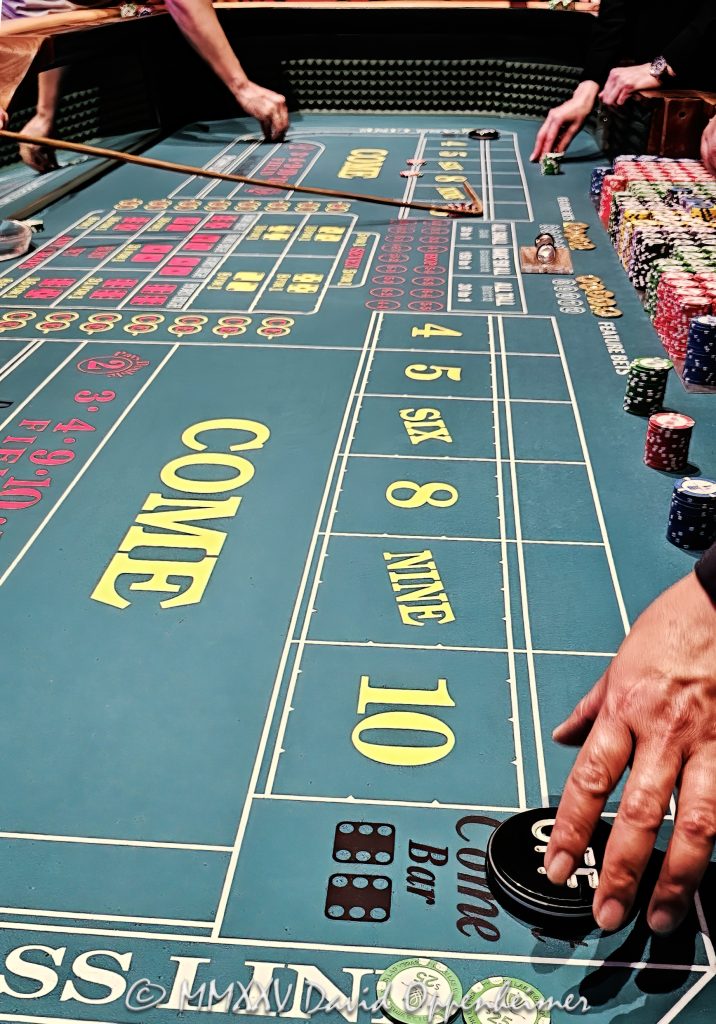 Craps Table at Wynn Las Vegas Casino Craps table at Wynn Las Vegas Resort and Casino in Las Vegas, Nevada - © 2025 David Oppenheimer - Performance Impressions casino photography archives - https://performanceimpressions.com craps, craps table, Wynn Casino, casino, Wynn craps table, dice, chips, casino chips, gaming, play, betting, odds, win, gambling, wager, bet, luck, gamble, 3355 S Las Vegas Blvd, 89109, Wynn, Encore, Encore Las Vegas, Encore Resort, Encore Casino, Encore Vegas, Encore at Wynn, Wynn Las Vegas, Wynn Vegas, Wynn Resort, Wynn Resorts, 3131 Las Vegas Blvd S, 89109, hotel, resort, building, architecture, shops, shopping, bridge, night, lights, city lights, WYNN, WYNN stock, five star, luxury, Las Vegas, Vegas, Las Vegas Strip, table game, dice game, casino floor, entertainment, luxury gaming, Nevada casino, vacation, escape, dream, art, fine art, artwork, painting, Nevada, Nevada photography, colorful, wall art, United States, vertical, color, 1-14993092111