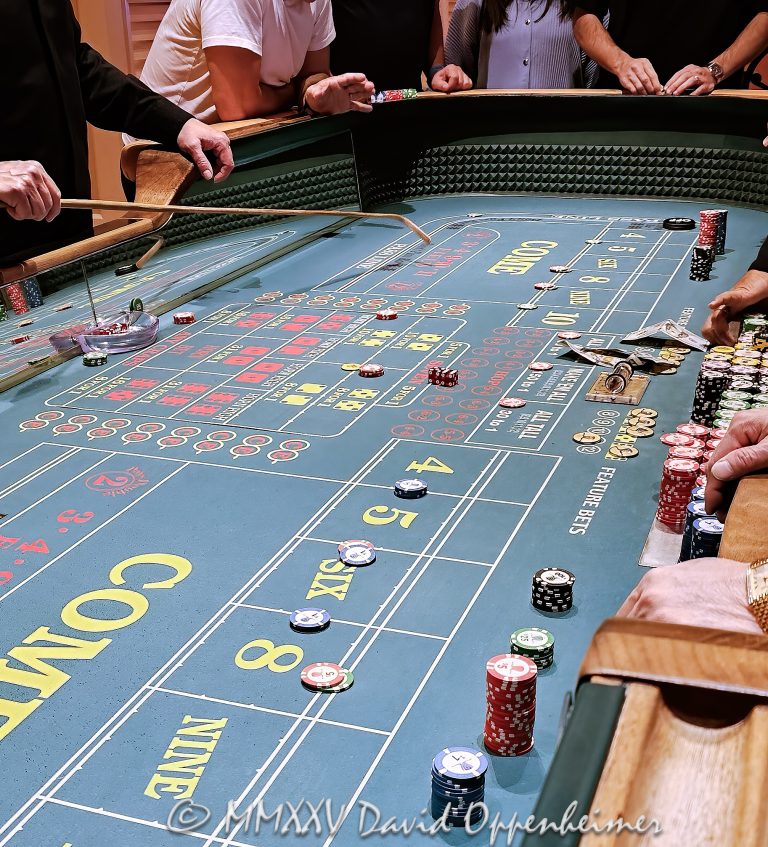 Craps table at Wynn Las Vegas Resort and Casino in Las Vegas, Nevada - © 2025 David Oppenheimer - Performance Impressions casino photography archives - https://performanceimpressions.com craps, craps table, Wynn Casino, casino, Wynn craps table, dice, chips, casino chips, gaming, play, betting, odds, win, gambling, wager, bet, luck, gamble, 3355 S Las Vegas Blvd, 89109, Wynn, Encore, Encore Las Vegas, Encore Resort, Encore Casino, Encore Vegas, Encore at Wynn, Wynn Las Vegas, Wynn Vegas, Wynn Resort, Wynn Resorts, 3131 Las Vegas Blvd S, 89109, hotel, resort, building, architecture, shops, shopping, bridge, night, lights, city lights, WYNN, WYNN stock, five star, luxury, Las Vegas, Vegas, Las Vegas Strip, table game, dice game, casino floor, entertainment, luxury gaming, Nevada casino, vacation, escape, dream, art, fine art, artwork, painting, Nevada, Nevada photography, colorful, wall art, United States, vertical, color, 1-14993092111
