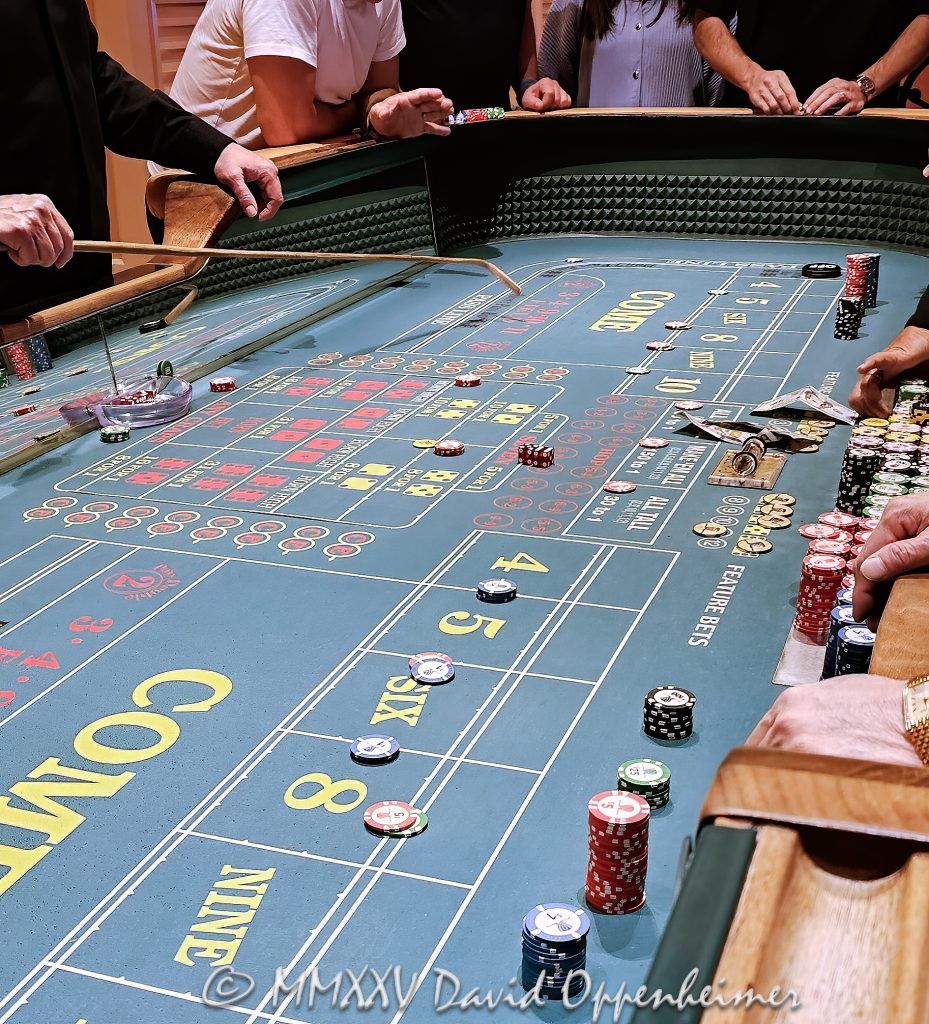 Craps Table at Wynn Las Vegas Casino Craps table at Wynn Las Vegas Resort and Casino in Las Vegas, Nevada - © 2025 David Oppenheimer - Performance Impressions casino photography archives - https://performanceimpressions.com craps, craps table, Wynn Casino, casino, Wynn craps table, dice, chips, casino chips, gaming, play, betting, odds, win, gambling, wager, bet, luck, gamble, 3355 S Las Vegas Blvd, 89109, Wynn, Encore, Encore Las Vegas, Encore Resort, Encore Casino, Encore Vegas, Encore at Wynn, Wynn Las Vegas, Wynn Vegas, Wynn Resort, Wynn Resorts, 3131 Las Vegas Blvd S, 89109, hotel, resort, building, architecture, shops, shopping, bridge, night, lights, city lights, WYNN, WYNN stock, five star, luxury, Las Vegas, Vegas, Las Vegas Strip, table game, dice game, casino floor, entertainment, luxury gaming, Nevada casino, vacation, escape, dream, art, fine art, artwork, painting, Nevada, Nevada photography, colorful, wall art, United States, vertical, color, 1-14993092111